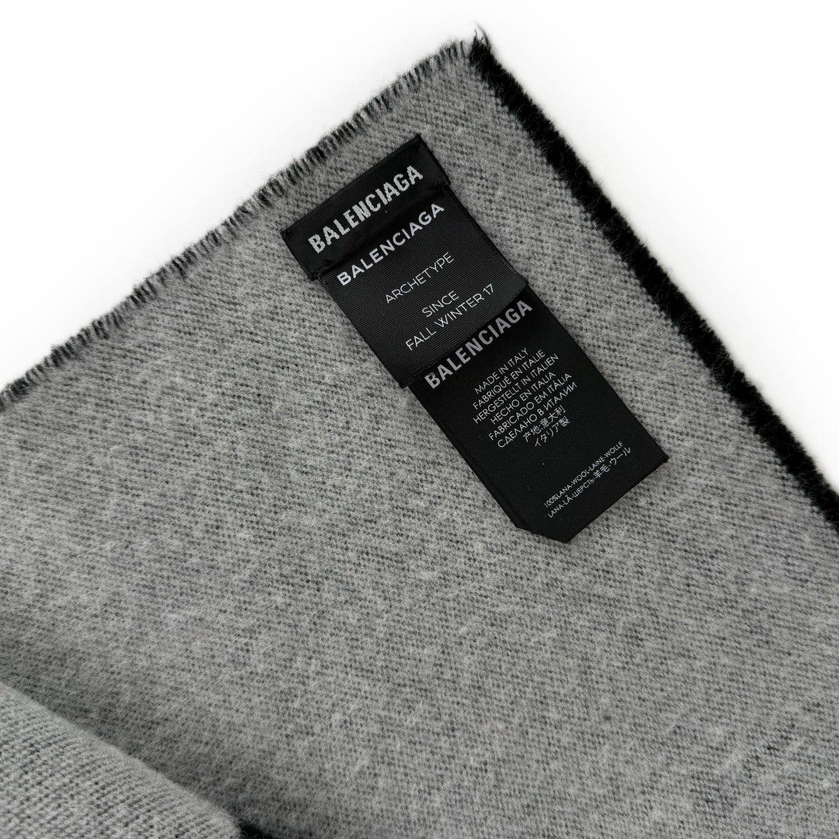 Grey wool Balenciaga Archetype scarf with brand labels, curated Pre-loved Luxury by Myluxe in Helsinki.