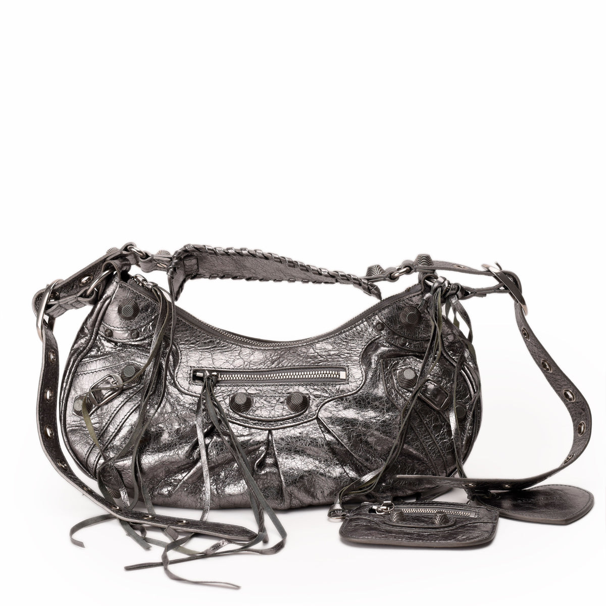 Metallic silver leather hobo bag with studs and tassels, curated Pre-loved Luxury by Myluxe in Helsinki.