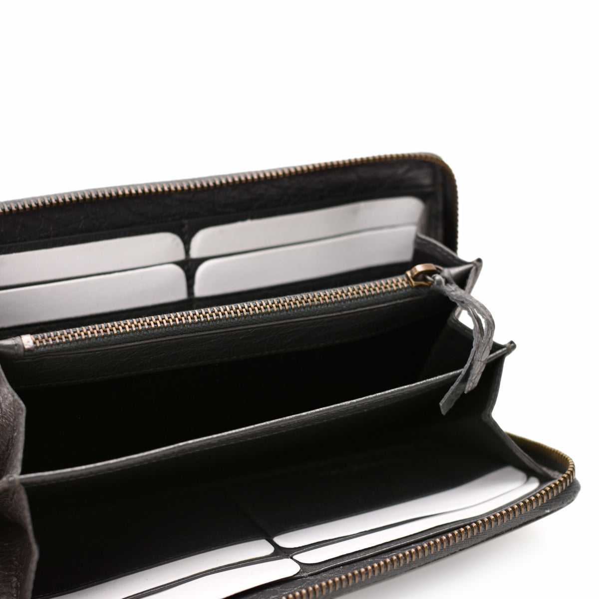 Open black leather zip-around wallet with multiple card slots, curated Pre-loved Luxury by Myluxe in Helsinki.