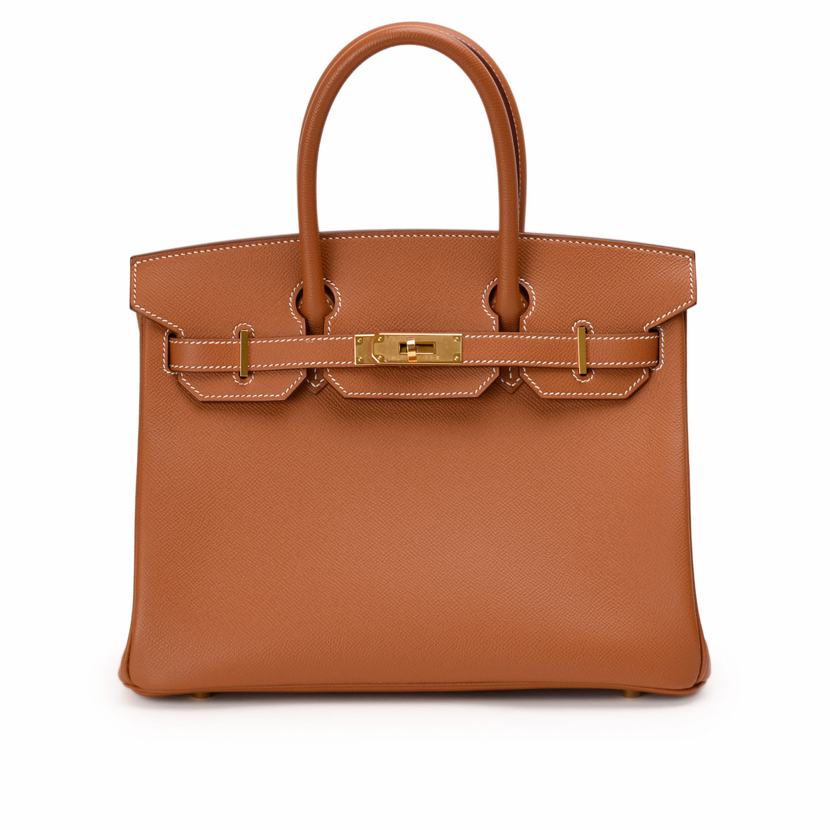 Hermès tan leather handbag with gold hardware. curated Pre-loved Luxury by Myluxe in Helsinki.