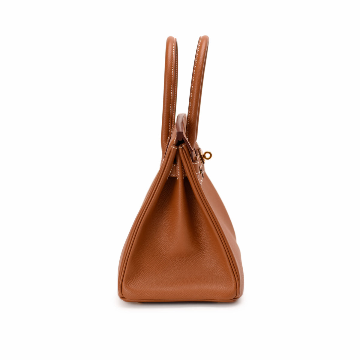 Tan leather Hermès handbag with structured top handles. curated Pre-loved Luxury by Myluxe in Helsinki.