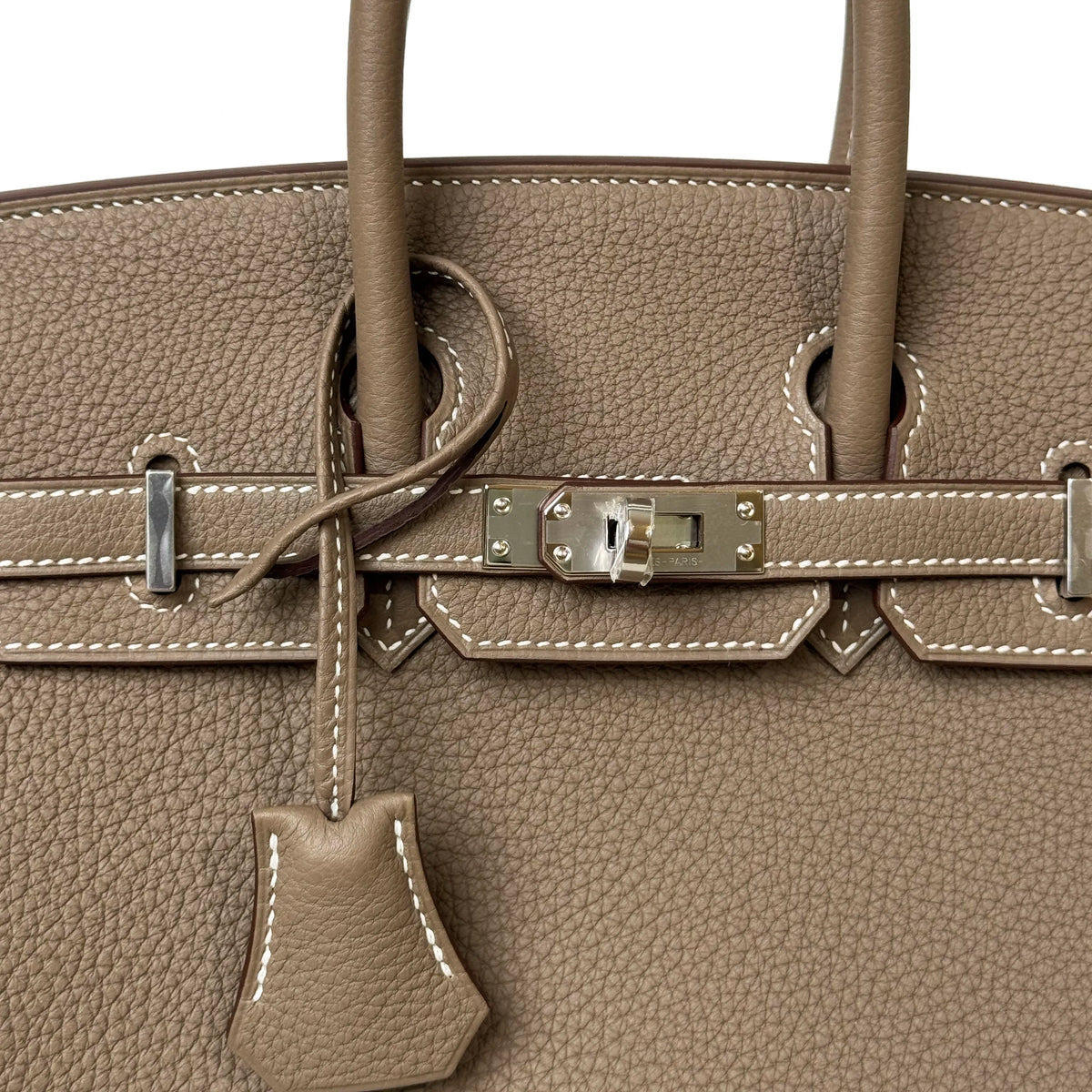 Tan grained leather luxury handbag with silver hardware, curated Pre-loved Luxury by Myluxe in Helsinki.