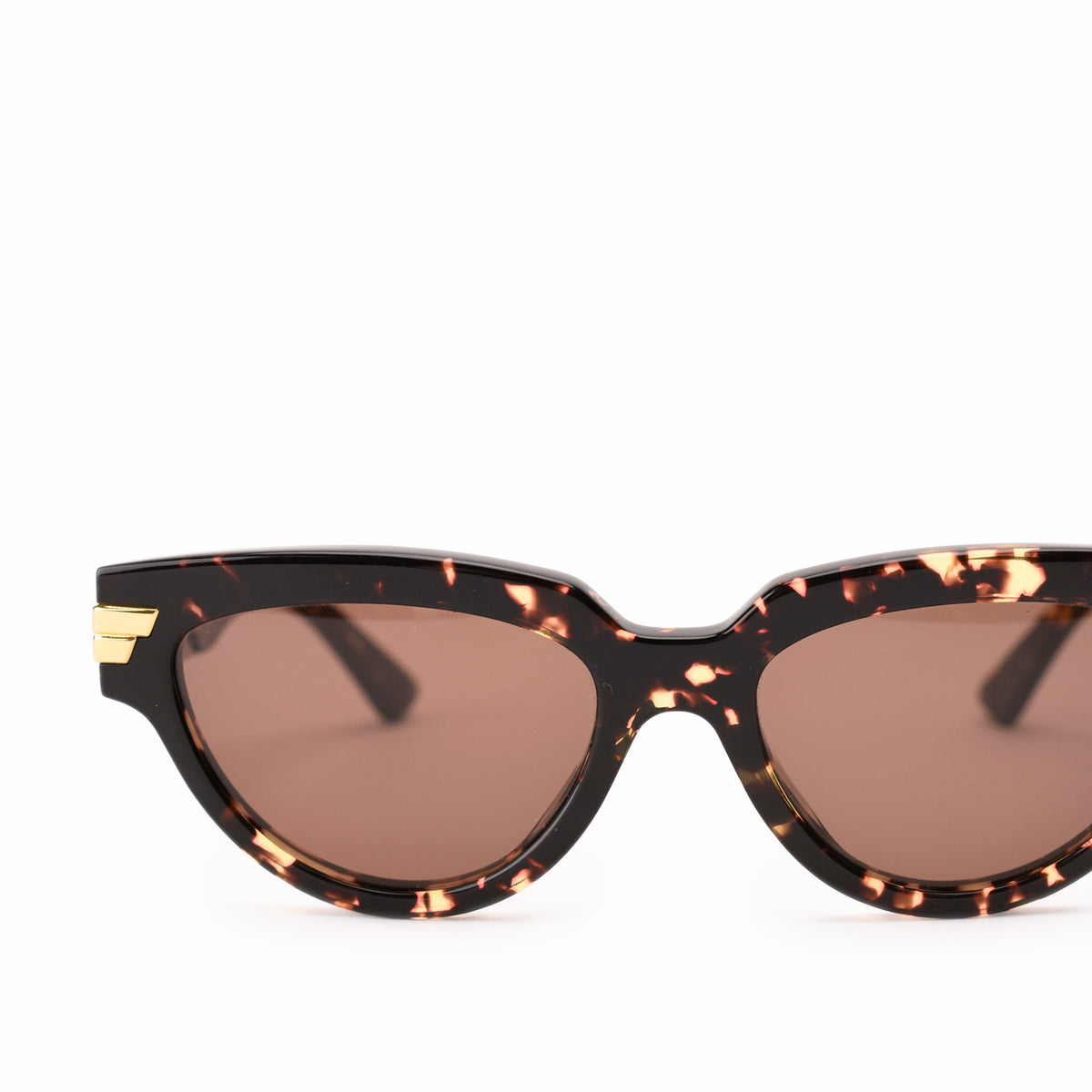 Tortoiseshell cat-eye sunglasses with brown tinted lenses, curated Pre-loved Luxury by Myluxe in Helsinki.
