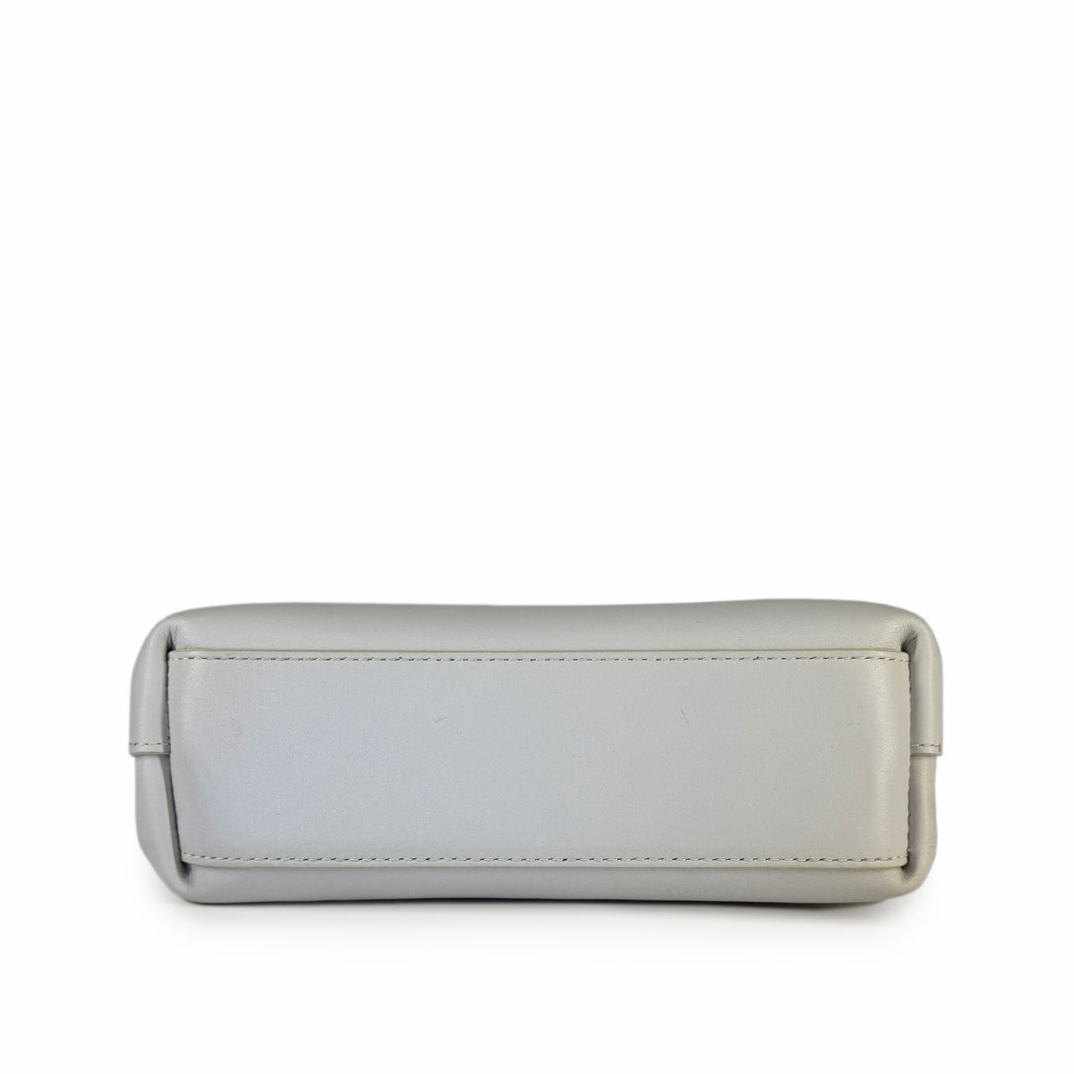 Bottom view of a light grey smooth leather luxury handbag, curated Pre-loved Luxury by Myluxe in Helsinki.