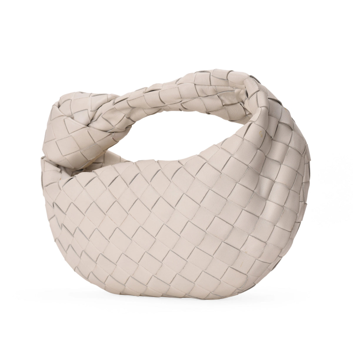 Bottega Veneta white woven leather knot handbag. curated Pre-loved Luxury by Myluxe in Helsinki.