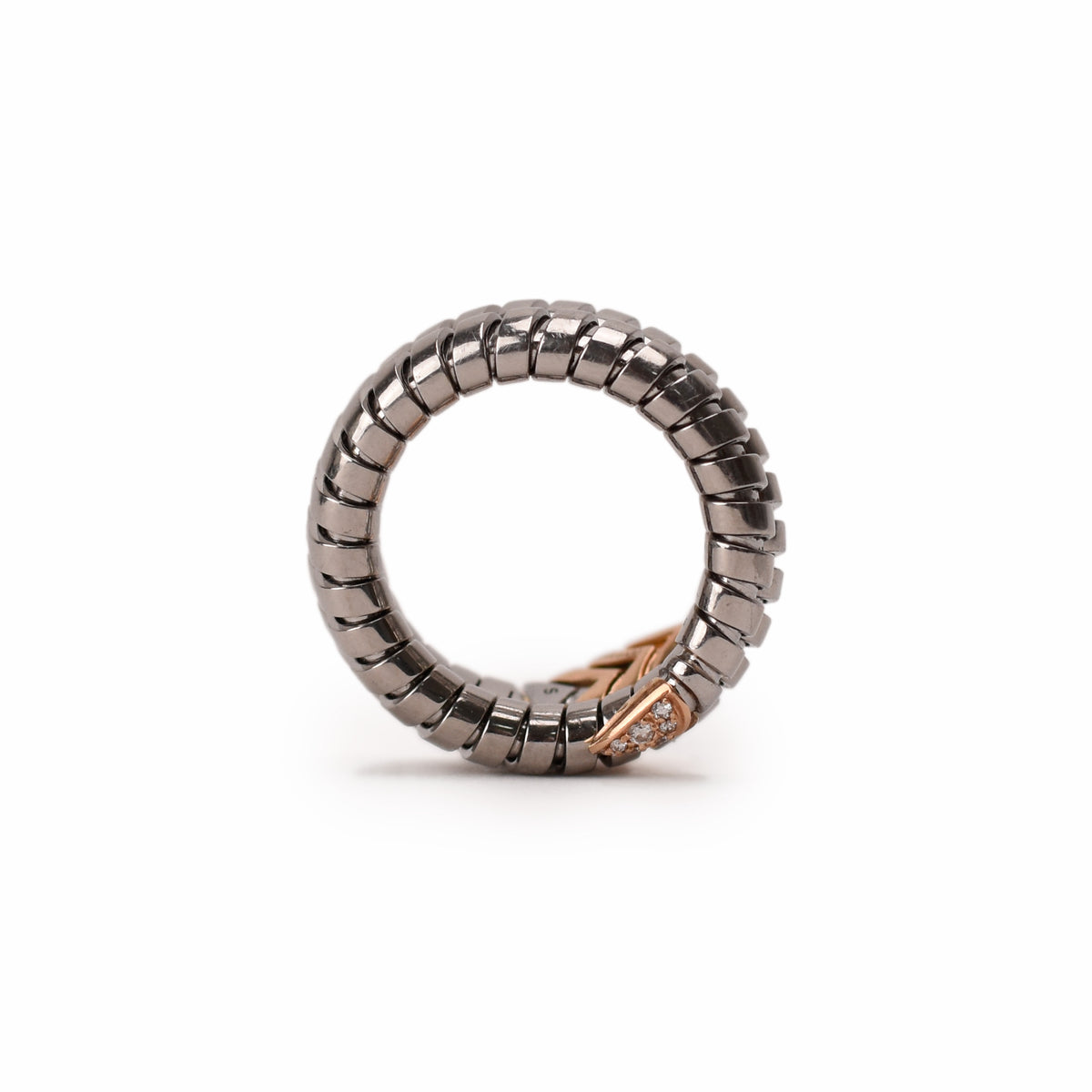 Grey metallic segmented ring with a rose gold diamond-set detail, curated Pre-loved Luxury by Myluxe in Helsinki.