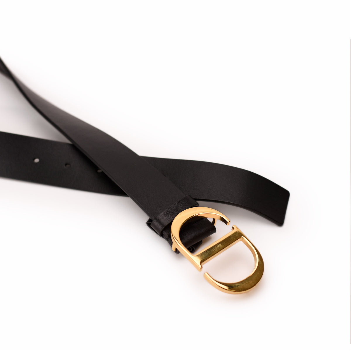 Dior black leather belt with gold-tone CD buckle. curated Pre-loved Luxury by Myluxe in Helsinki.
