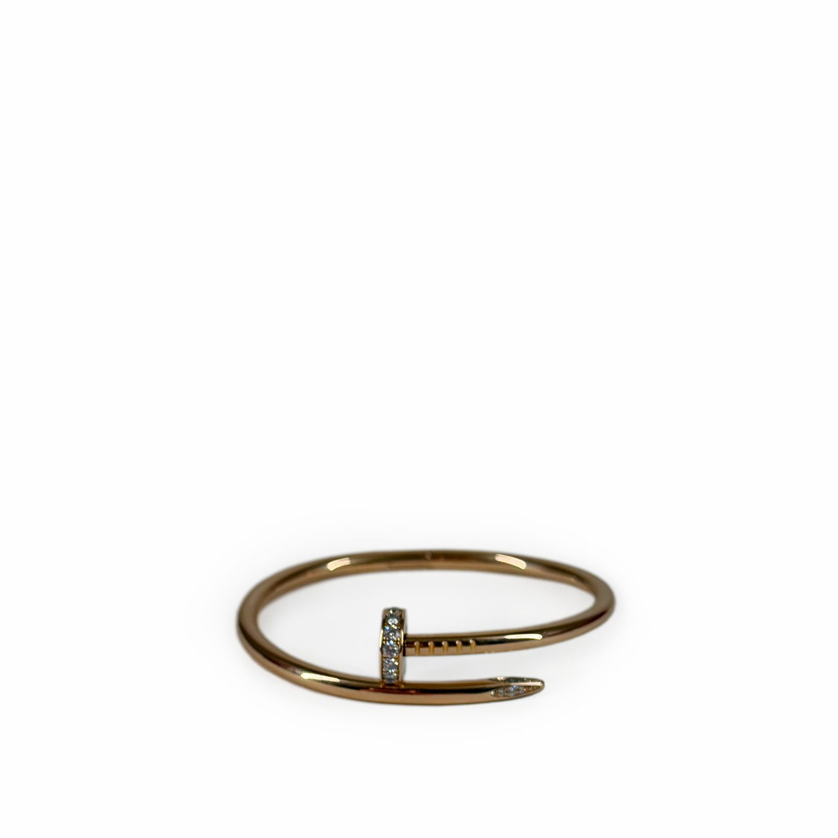Rose gold nail-shaped bangle with diamond accents, curated Pre-loved Luxury by Myluxe in Helsinki.