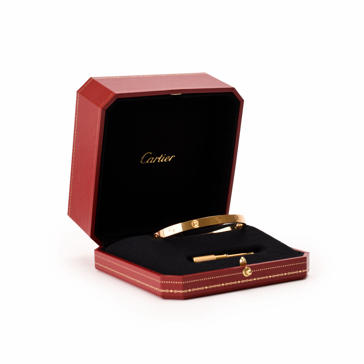 Cartier Love Bracelet in yellow gold with signature screw motifs and smooth polished finish, showcasing elegant jewelry design.