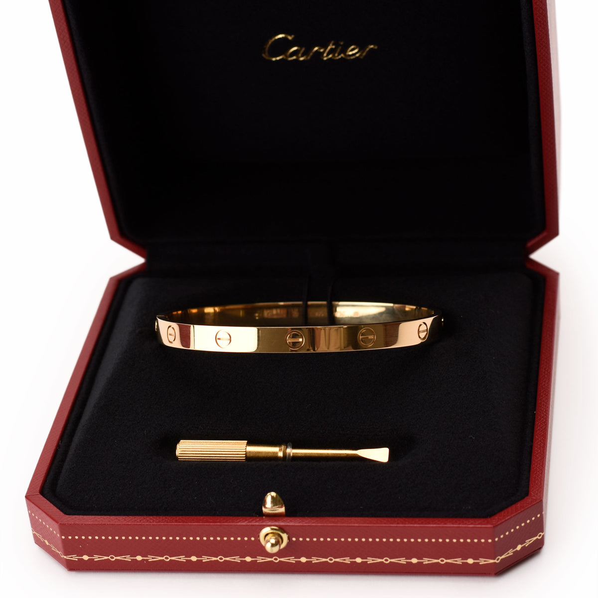 Cartier Love Bracelet in yellow gold featuring signature screw motifs and sleek, polished finish.
