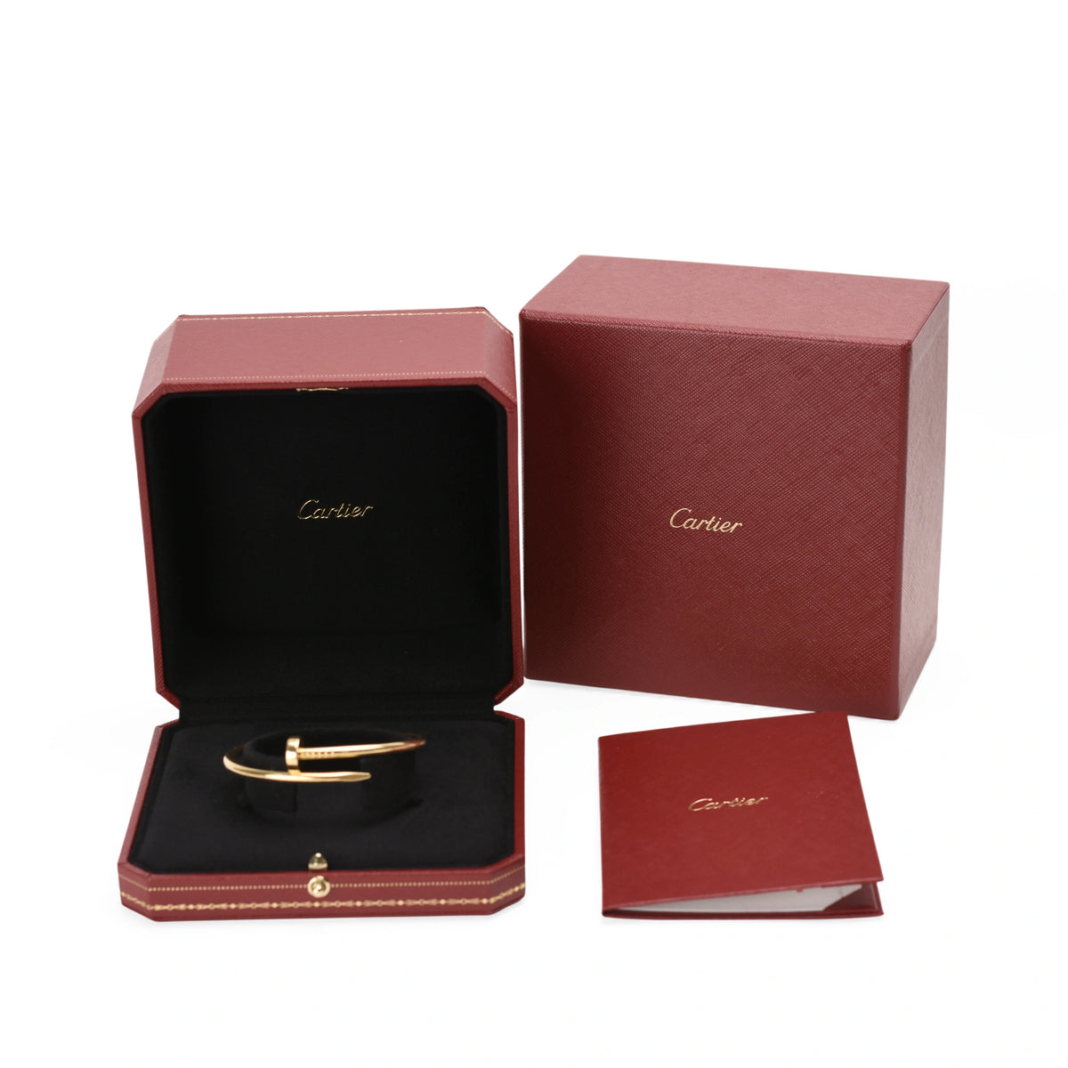 Cartier gold Love bracelet in a red signature gift box. curated Pre-loved Luxury by Myluxe in Helsinki.