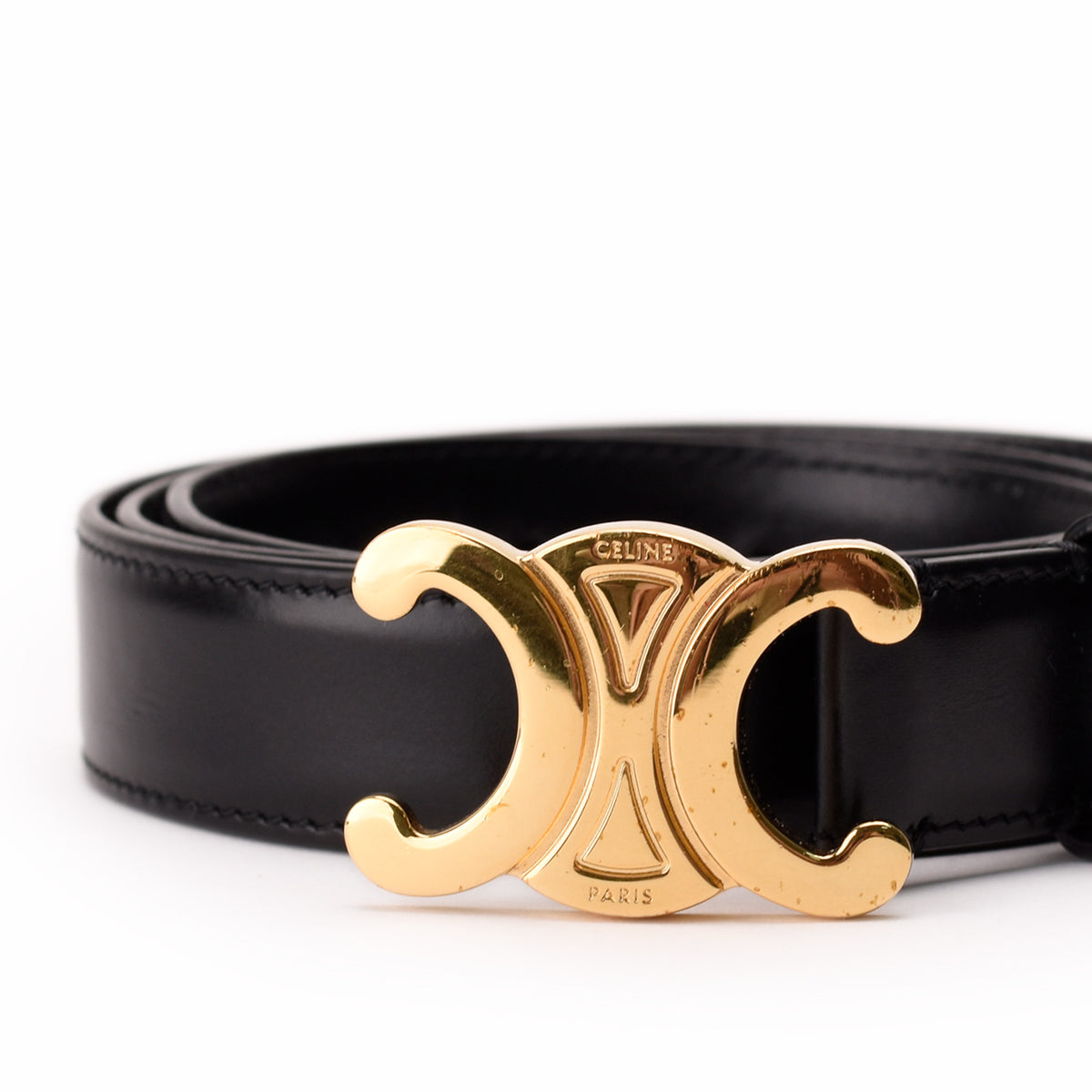Black leather Celine belt with gold-tone Triomphe buckle, curated Pre-loved Luxury by Myluxe in Helsinki.