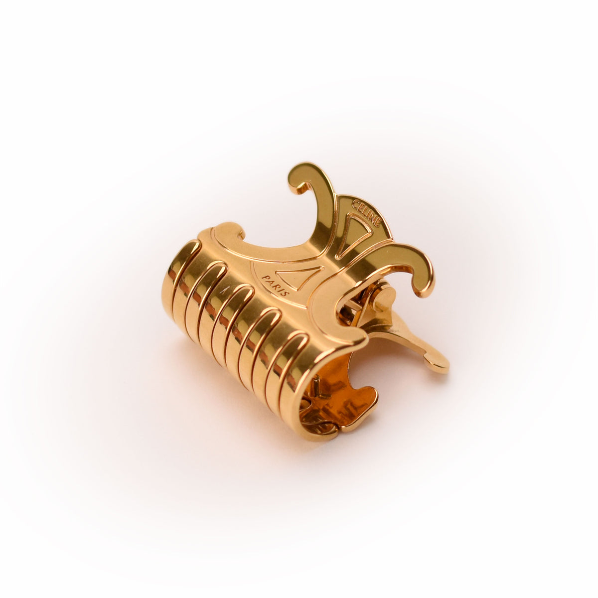 Gold-tone Celine Paris metal hair claw clip, curated Pre-loved Luxury by Myluxe in Helsinki.