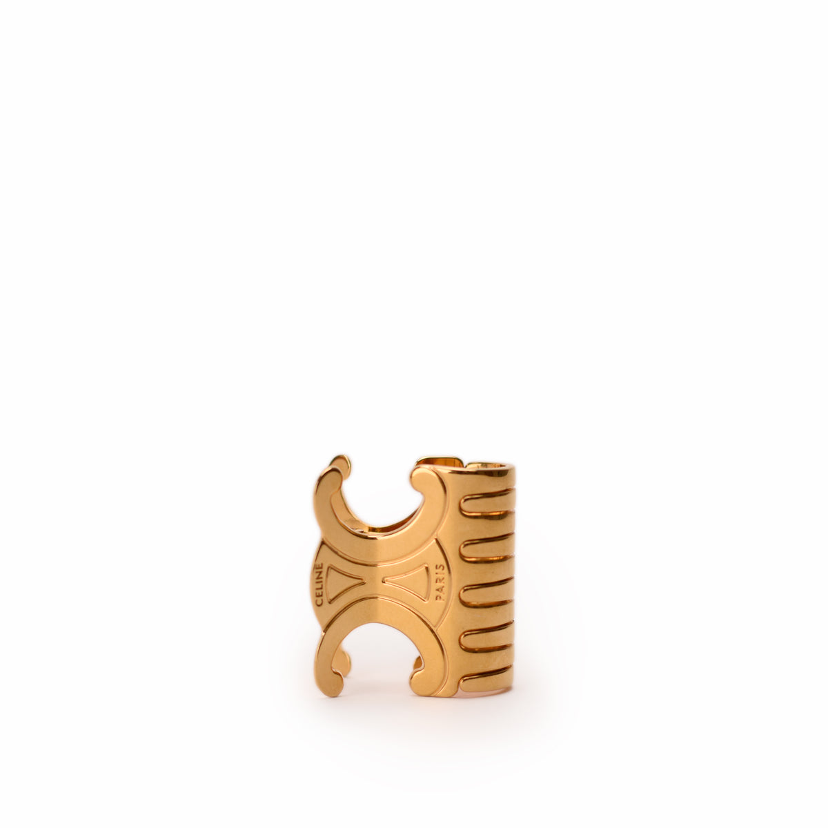 Gold Celine Paris cuff bracelet with engraved logo. curated Pre-loved Luxury by Myluxe in Helsinki.