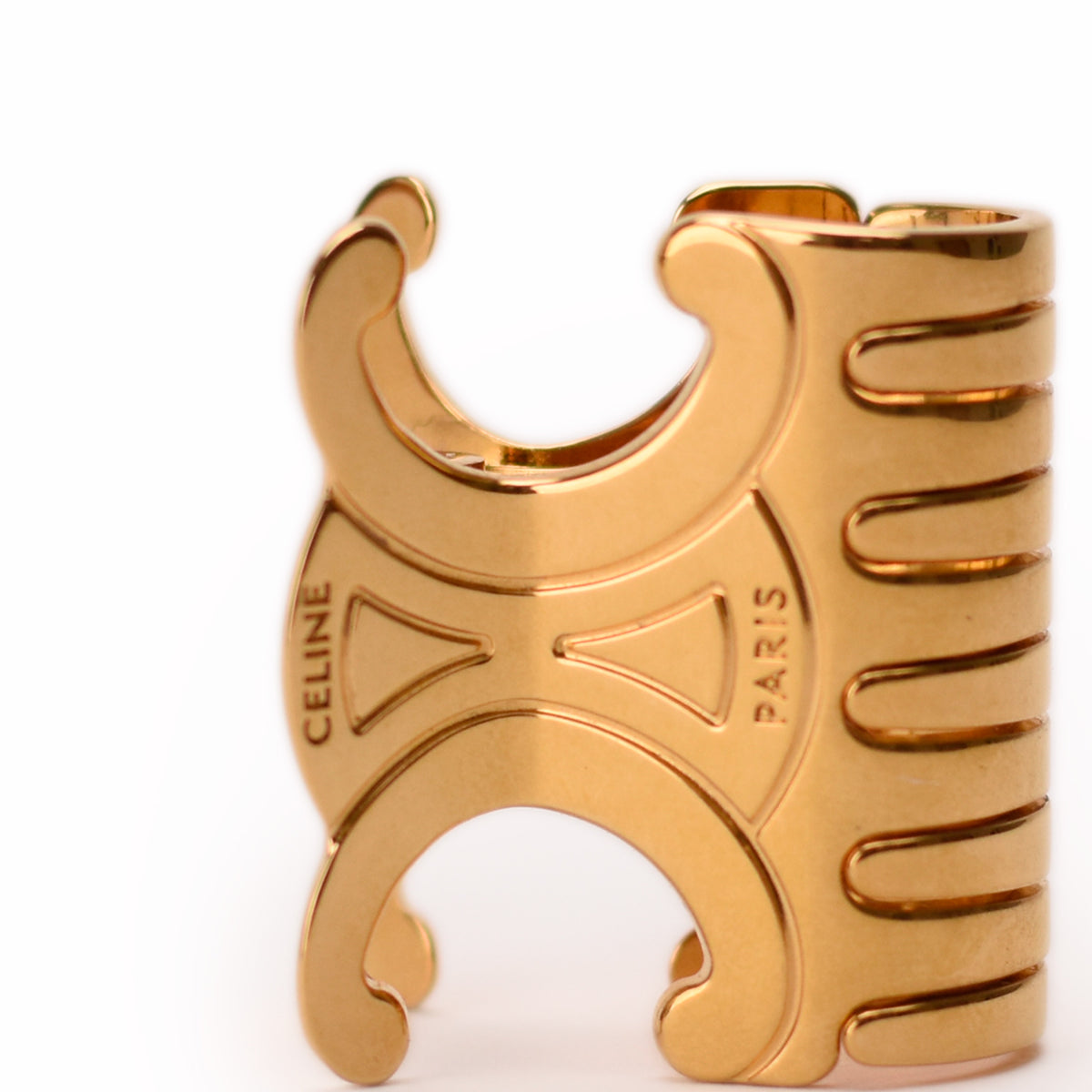 Gold-tone Celine Paris designer ring with sculptural ridges, curated Pre-loved Luxury by Myluxe in Helsinki.