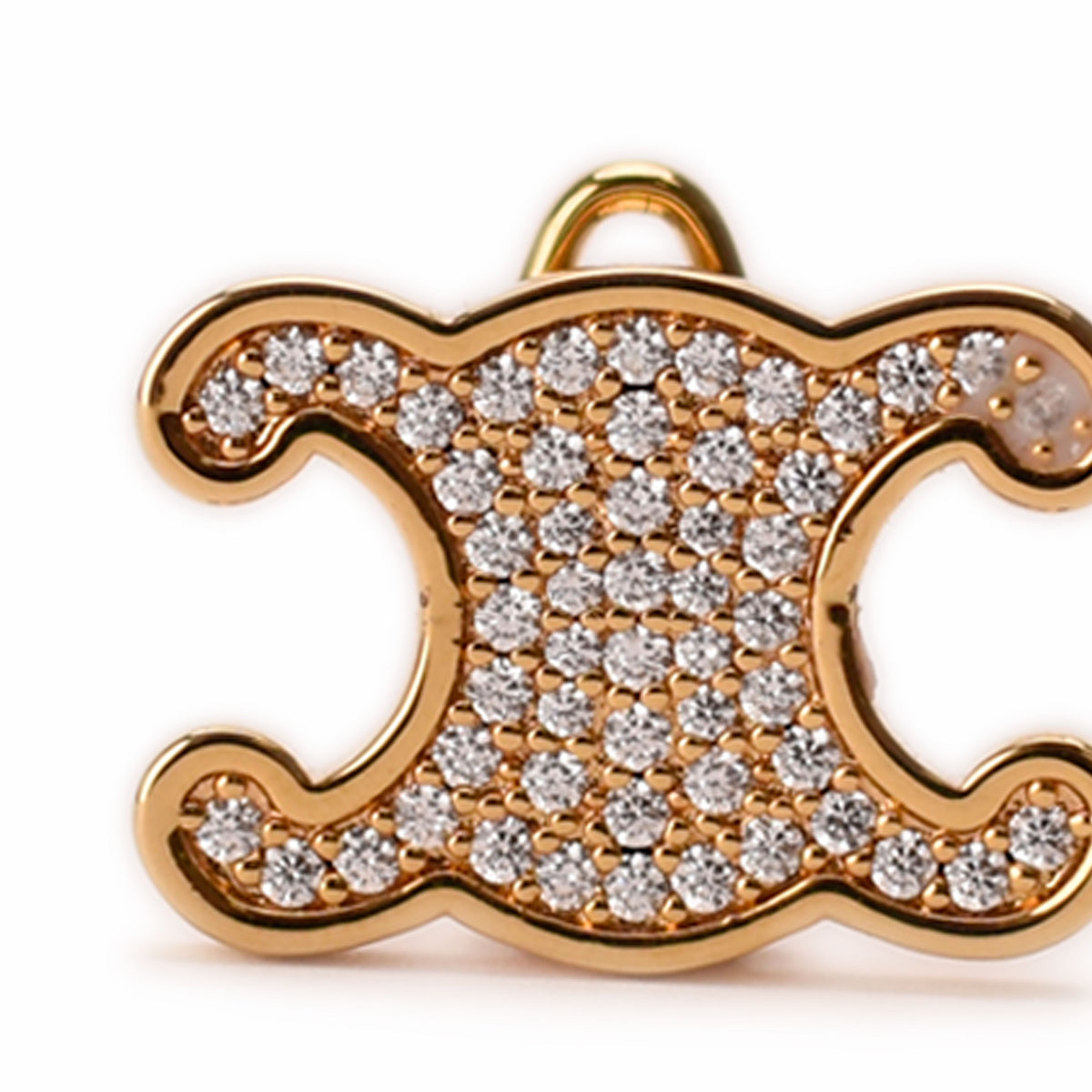 Gold-tone Celine logo pendant encrusted with sparkling diamonds, curated Pre-loved Luxury by Myluxe in Helsinki.