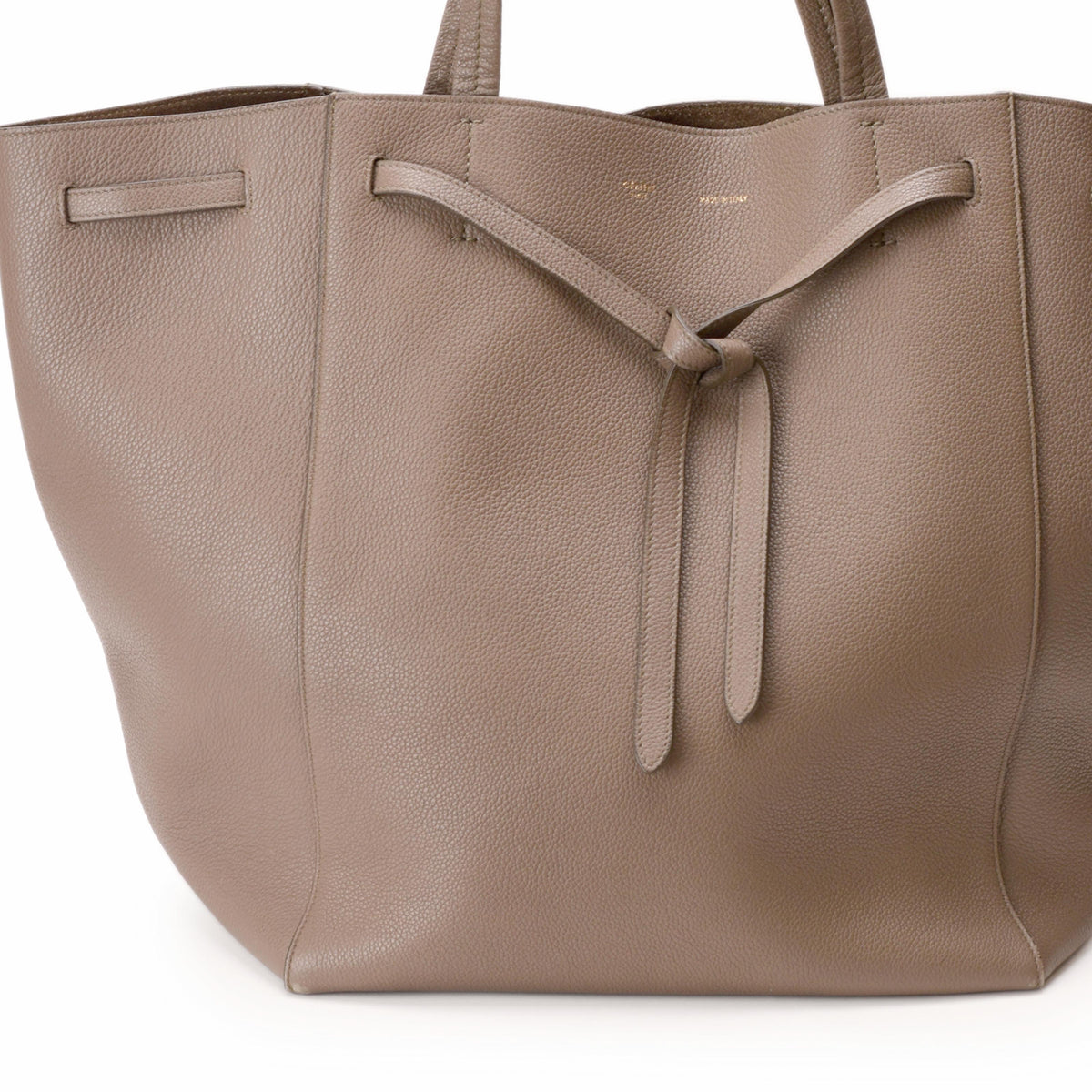 Taupe pebbled leather tote bag with drawstring detail. curated Pre-loved Luxury by Myluxe in Helsinki.