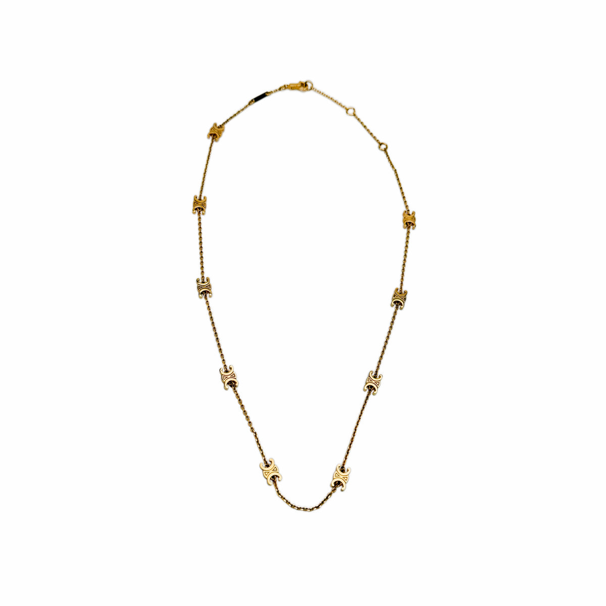 Gold-tone metal link necklace with geometric decorative elements, curated Pre-loved Luxury by Myluxe in Helsinki.