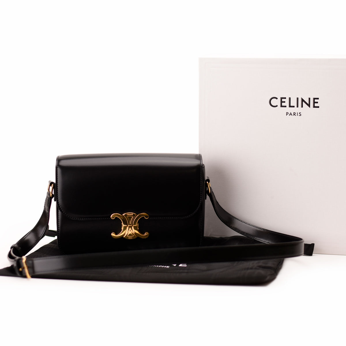 Black leather Celine Triomphe shoulder bag with gold-tone hardware. curated Pre-loved Luxury by Myluxe in Helsinki.