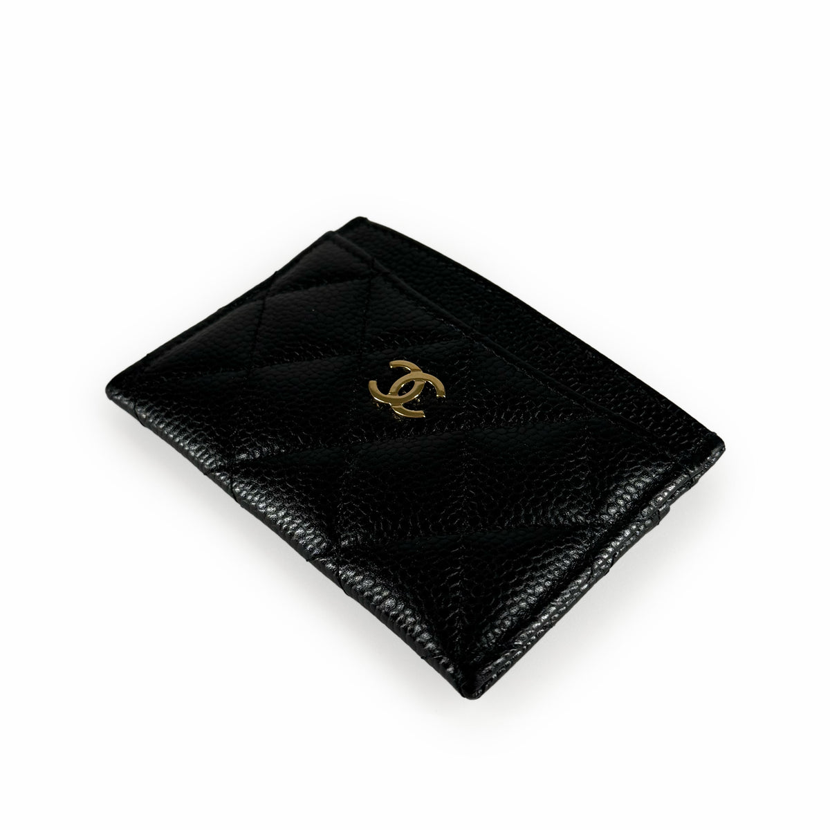 Black quilted lambskin Chanel card holder with gold-tone CC logo, curated Pre-loved Luxury by Myluxe in Helsinki.