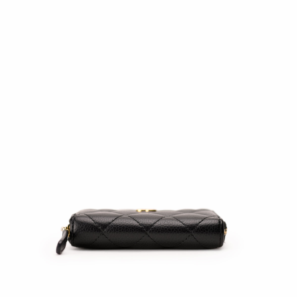 Black quilted lambskin leather Chanel wallet with gold-tone hardware. curated Pre-loved Luxury by Myluxe in Helsinki.