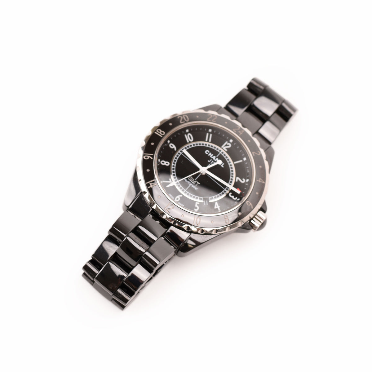 Chanel J12 black ceramic automatic watch with silver accents. curated Pre-loved Luxury by Myluxe in Helsinki.