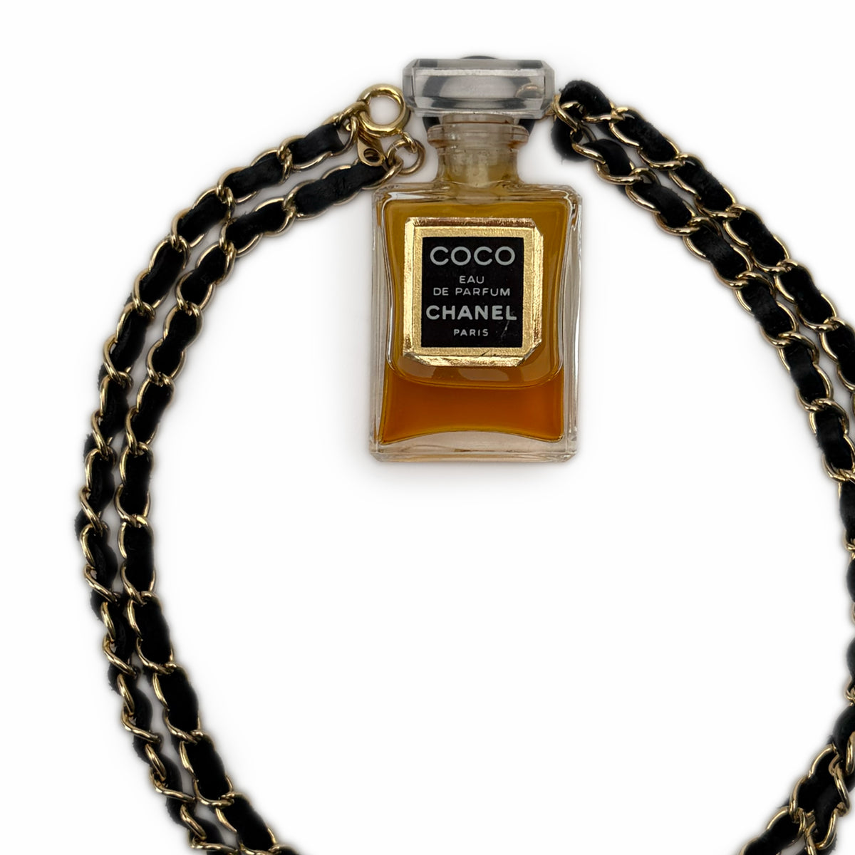Chanel Coco Eau de Parfum in a glass bottle with a black and gold chain, curated Pre-loved Luxury by Myluxe in Helsinki.