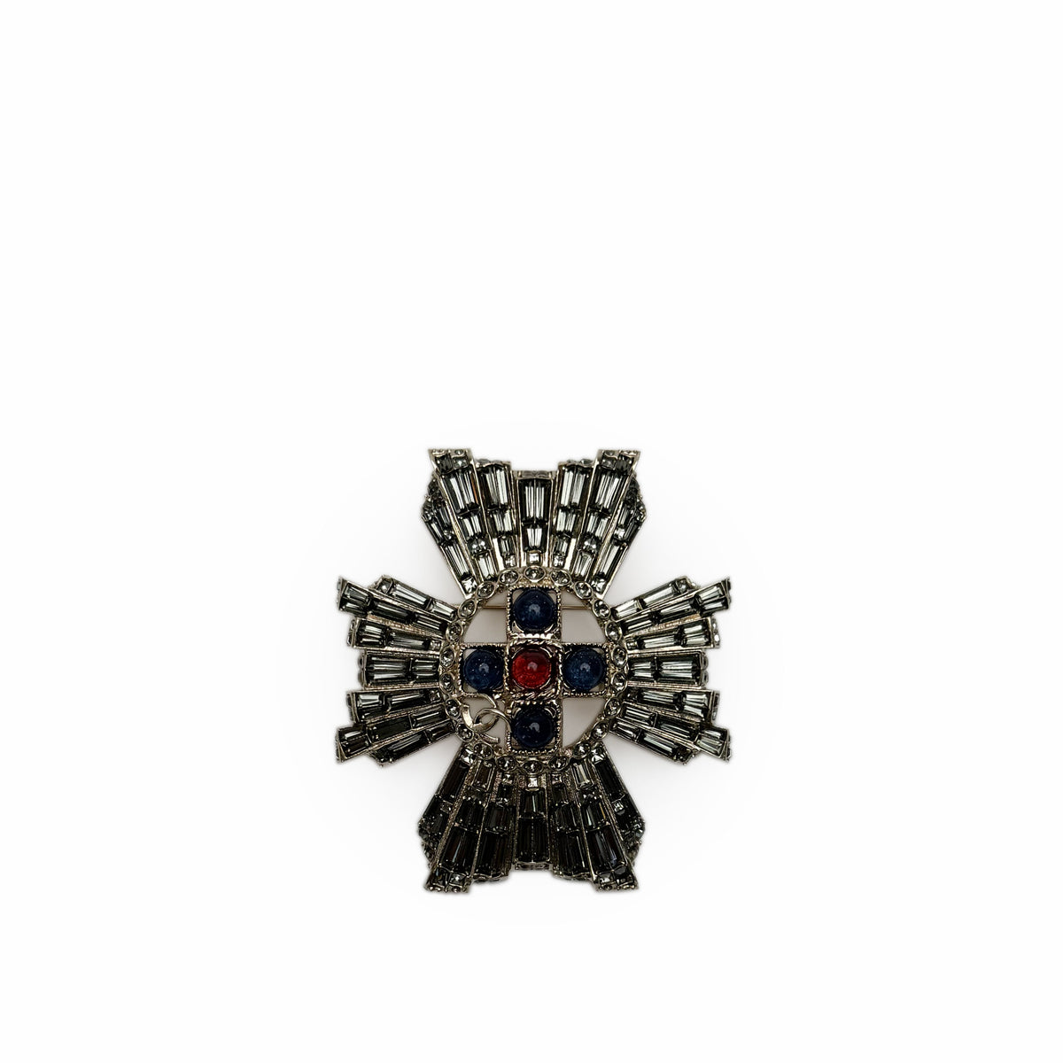 Silver-tone cross brooch featuring dark blue and red gemstones, curated Pre-loved Luxury by Myluxe in Helsinki.