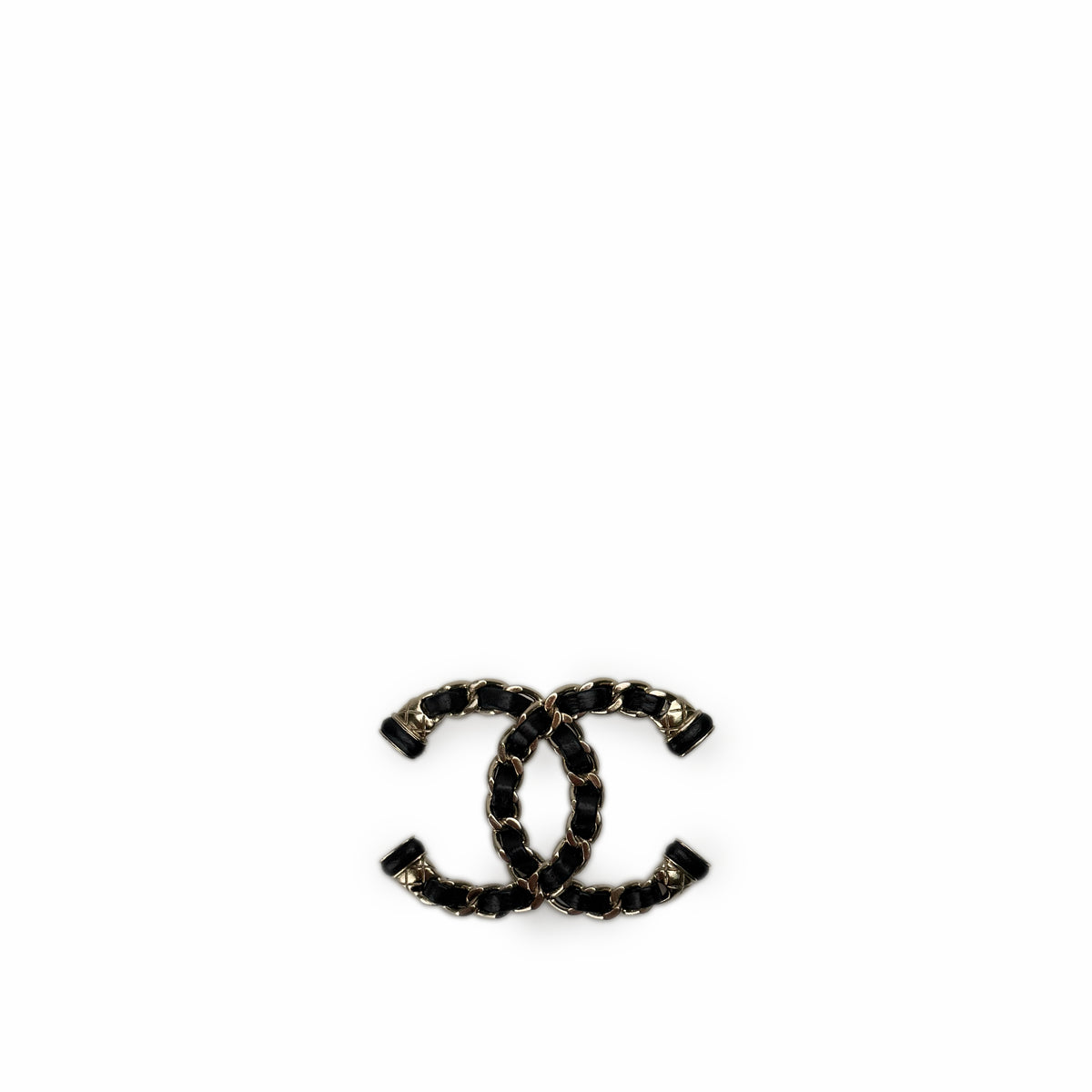Chanel interlocking CC logo in black leather and gold-tone metal, curated Pre-loved Luxury by Myluxe in Helsinki.