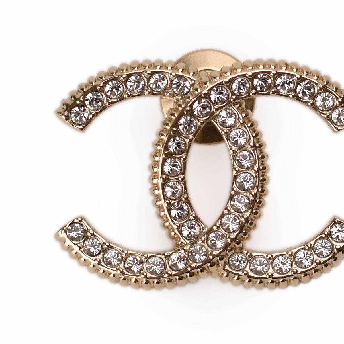 Gold-tone Chanel interlocking CC earrings encrusted with sparkling crystals. curated Pre-loved Luxury by Myluxe in Helsinki.