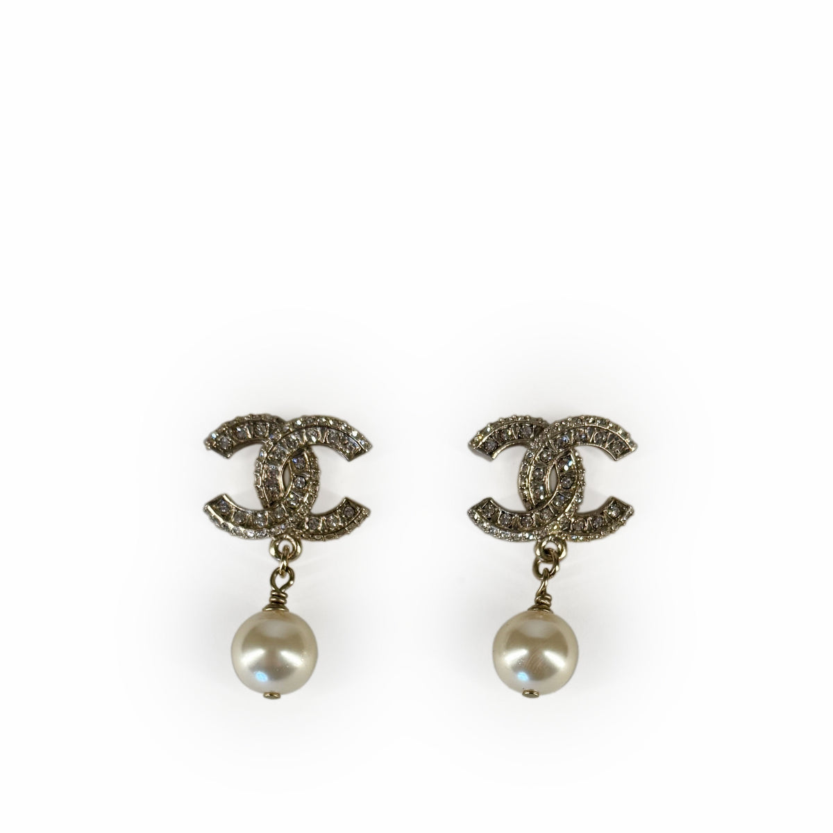 Gold-tone Chanel CC logo earrings with sparkling crystals and white pearl drops, curated Pre-loved Luxury by Myluxe in Helsinki.