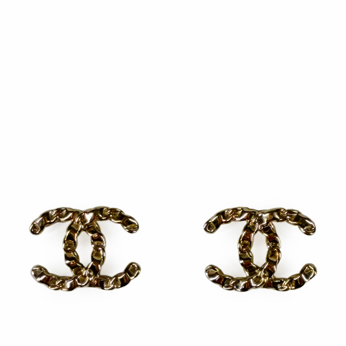 Gold-tone Chanel interlocking C earrings, curated Pre-loved Luxury by Myluxe in Helsinki.