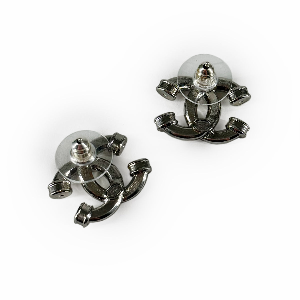 Silver-tone interlocking CC logo stud earrings, curated Pre-loved Luxury by Myluxe in Helsinki.