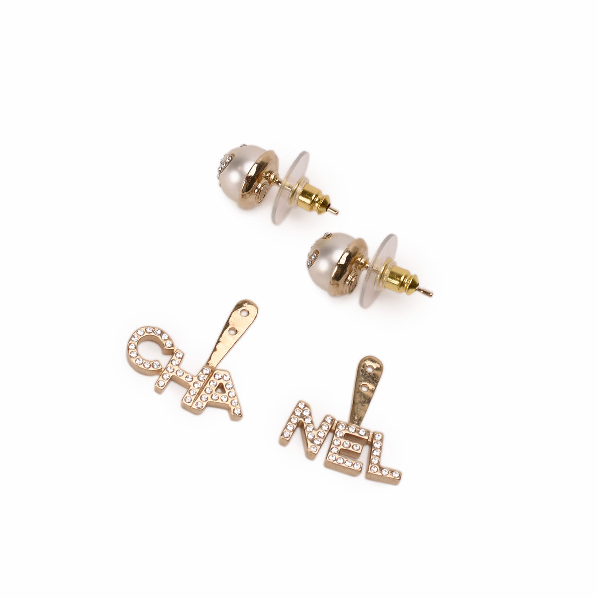 Chanel gold-tone stud earrings with white pearls and crystal embellishments. curated Pre-loved Luxury by Myluxe in Helsinki.
