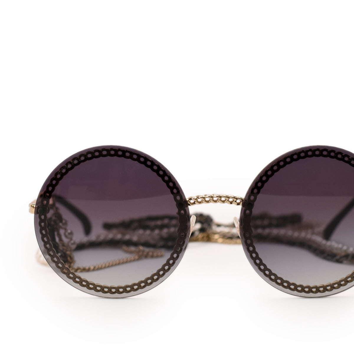 Round dark tinted sunglasses with gold chain detail, curated Pre-loved Luxury by Myluxe in Helsinki.