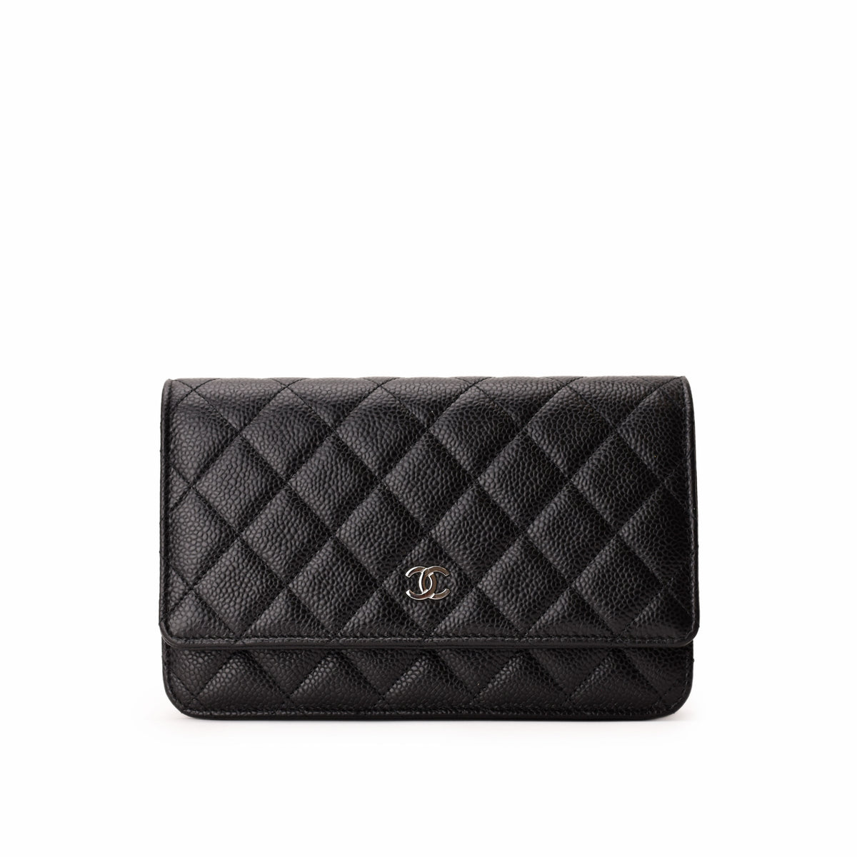 Black quilted leather Chanel wallet with silver CC logo, curated Pre-loved Luxury by Myluxe in Helsinki.