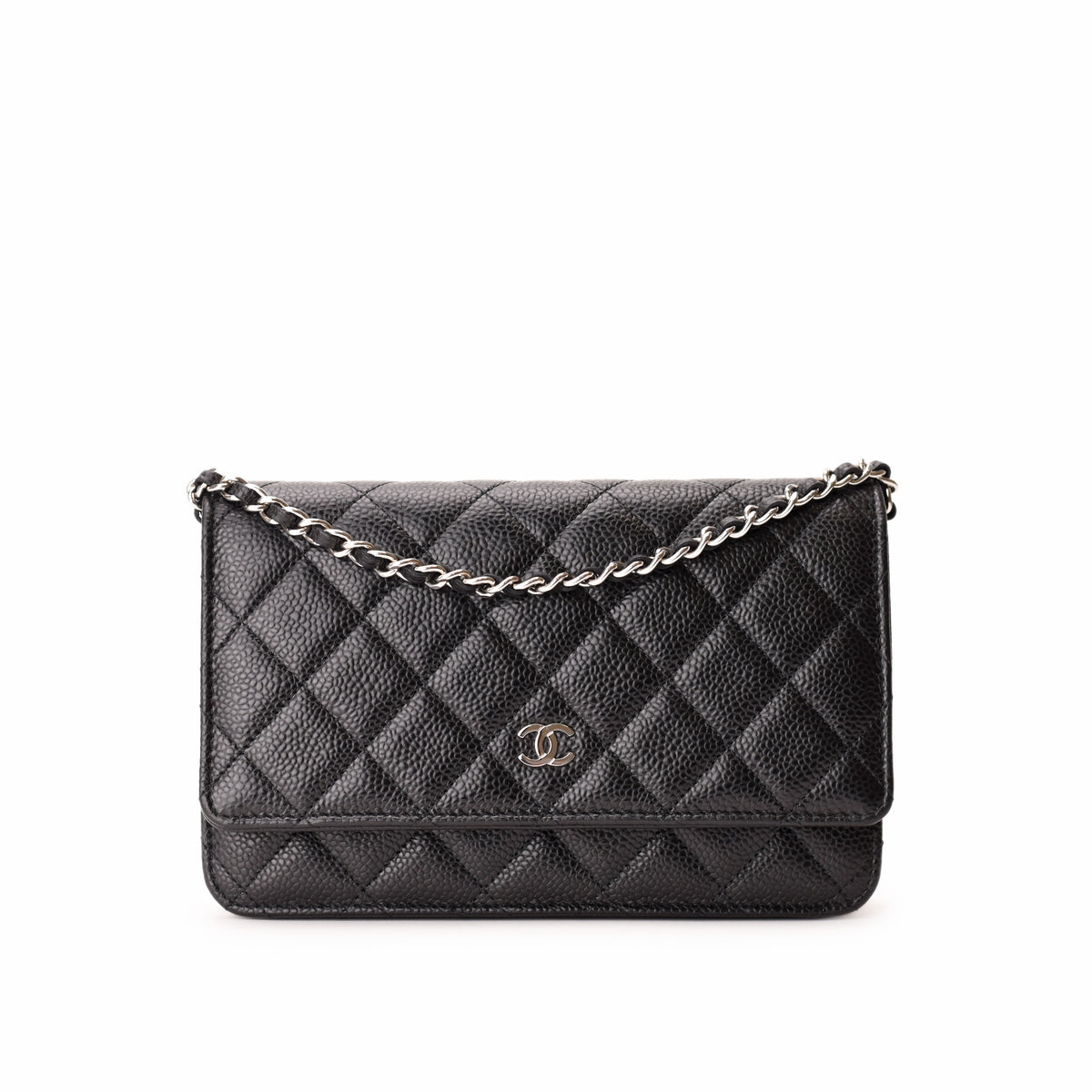 Black quilted caviar leather Chanel handbag with silver chain strap, curated Pre-loved Luxury by Myluxe in Helsinki.