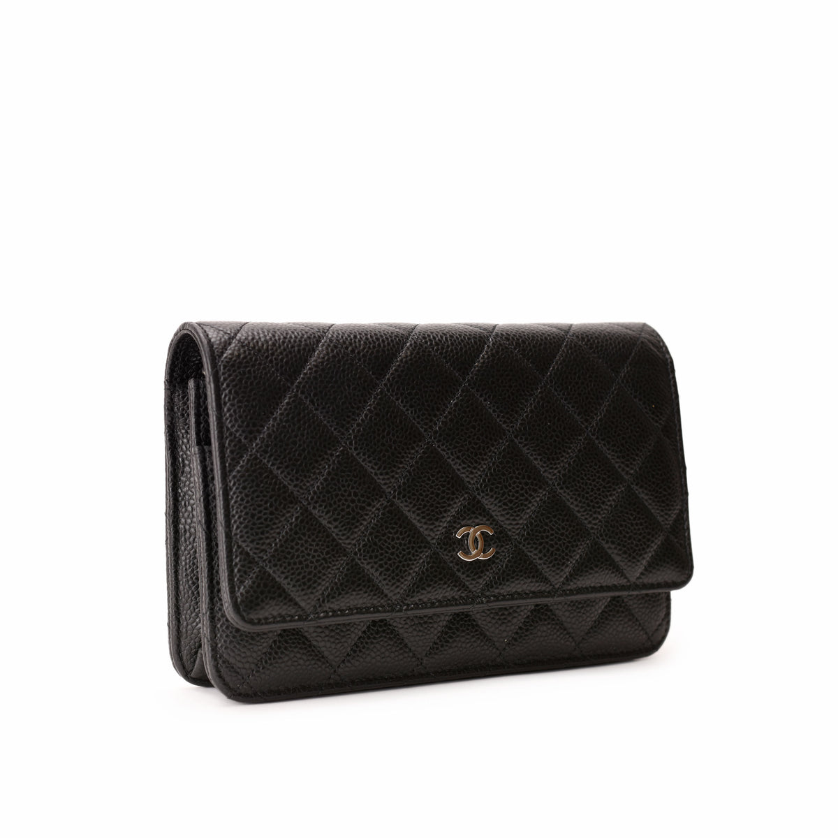 Black quilted leather Chanel wallet with gold-tone CC logo, curated Pre-loved Luxury by Myluxe in Helsinki.
