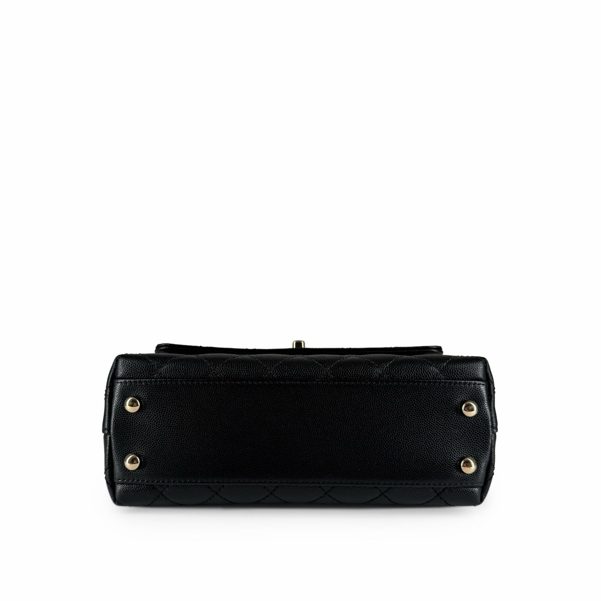 Bottom view of a black pebbled leather quilted designer handbag with gold-tone hardware, curated Pre-loved Luxury by Myluxe in Helsinki.