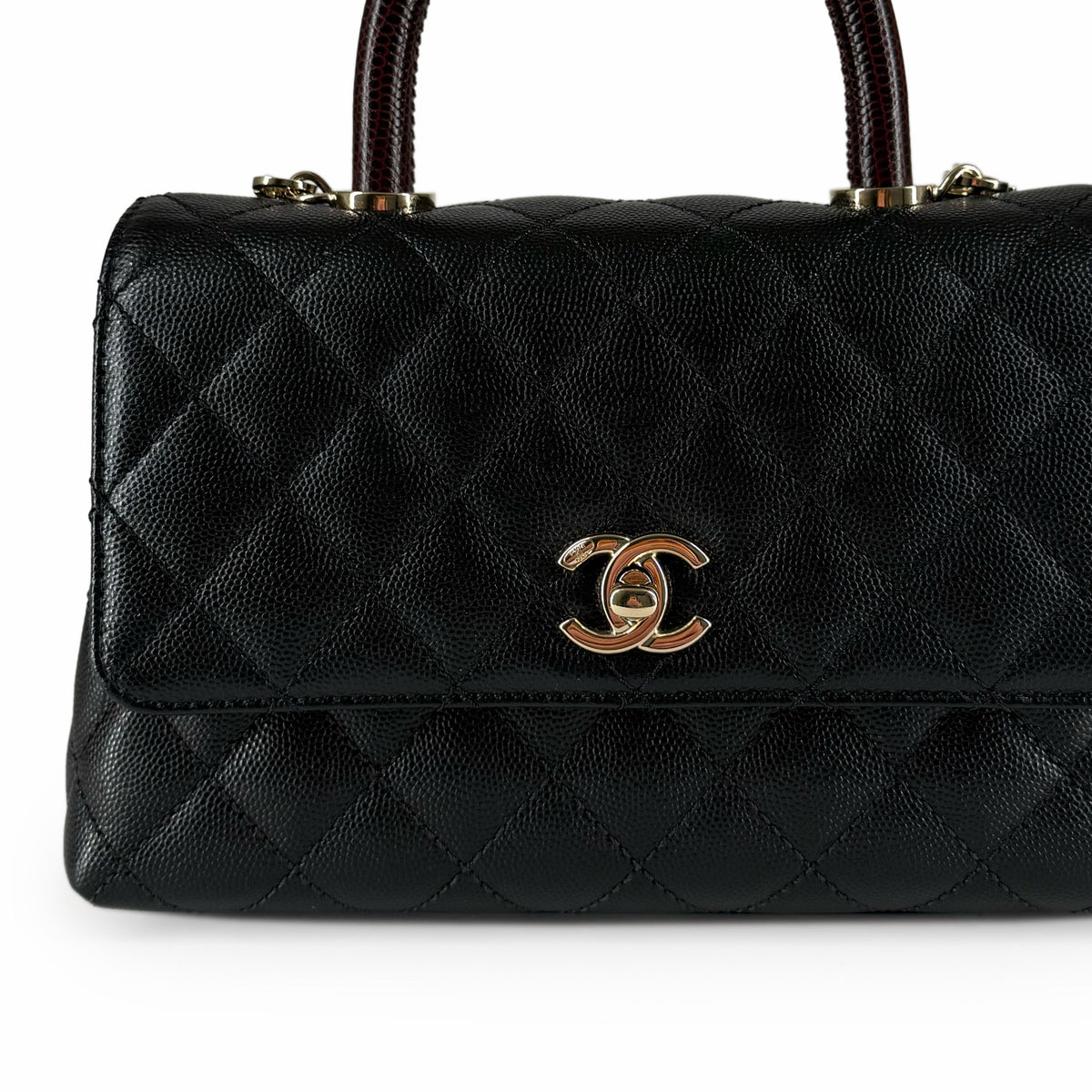 Black quilted caviar leather handbag with gold-tone interlocking CC logo, curated Pre-loved Luxury by Myluxe in Helsinki.