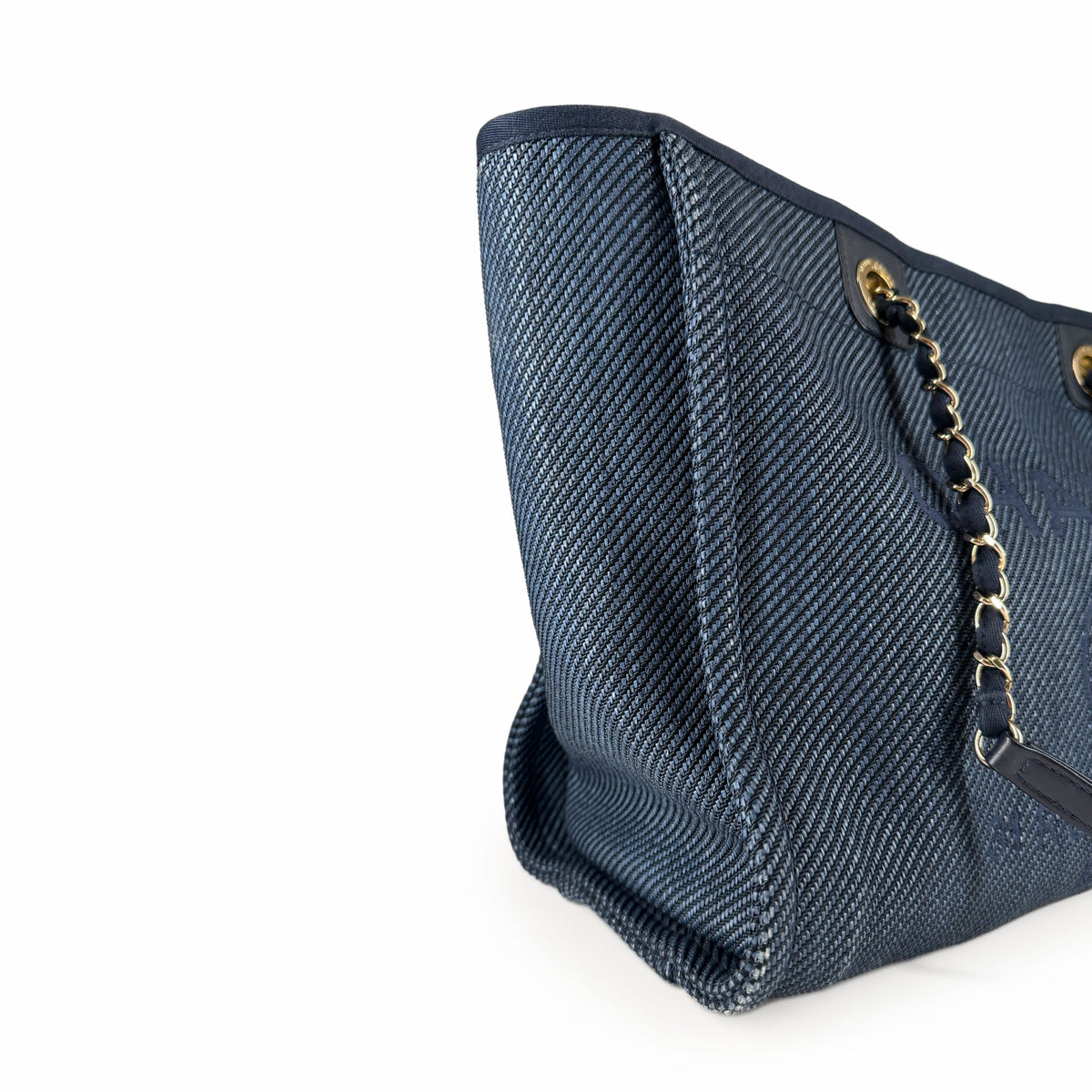 Navy blue textured fabric tote bag with gold chain strap, curated Pre-loved Luxury by Myluxe in Helsinki.