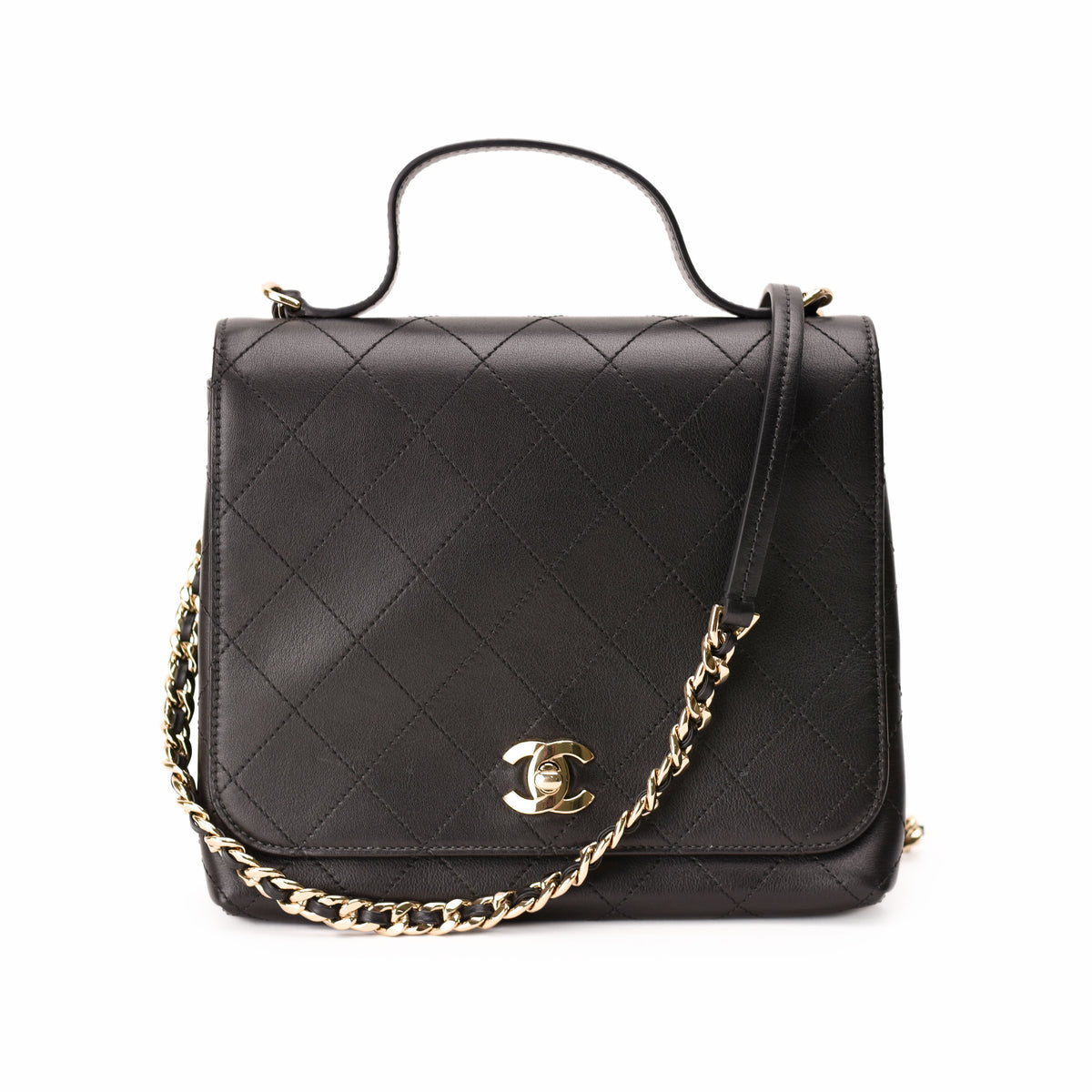 Black quilted leather Chanel handbag with gold-tone hardware and chain strap, curated Pre-loved Luxury by Myluxe in Helsinki.