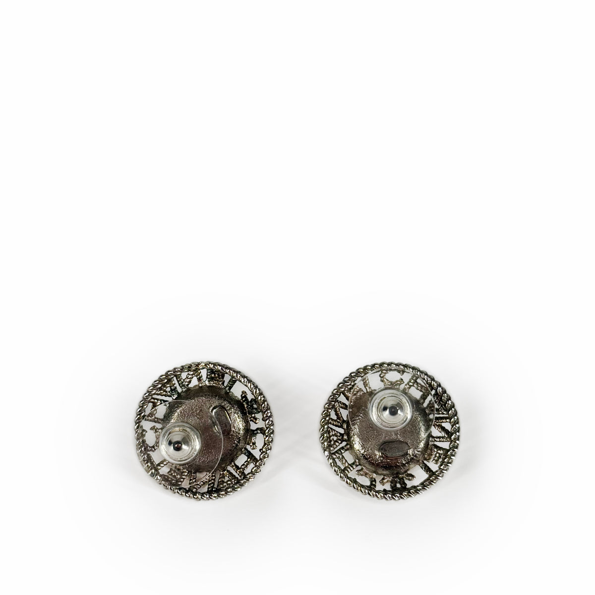 Intricate silver-tone filigree metal button earrings, curated Pre-loved Luxury by Myluxe in Helsinki.