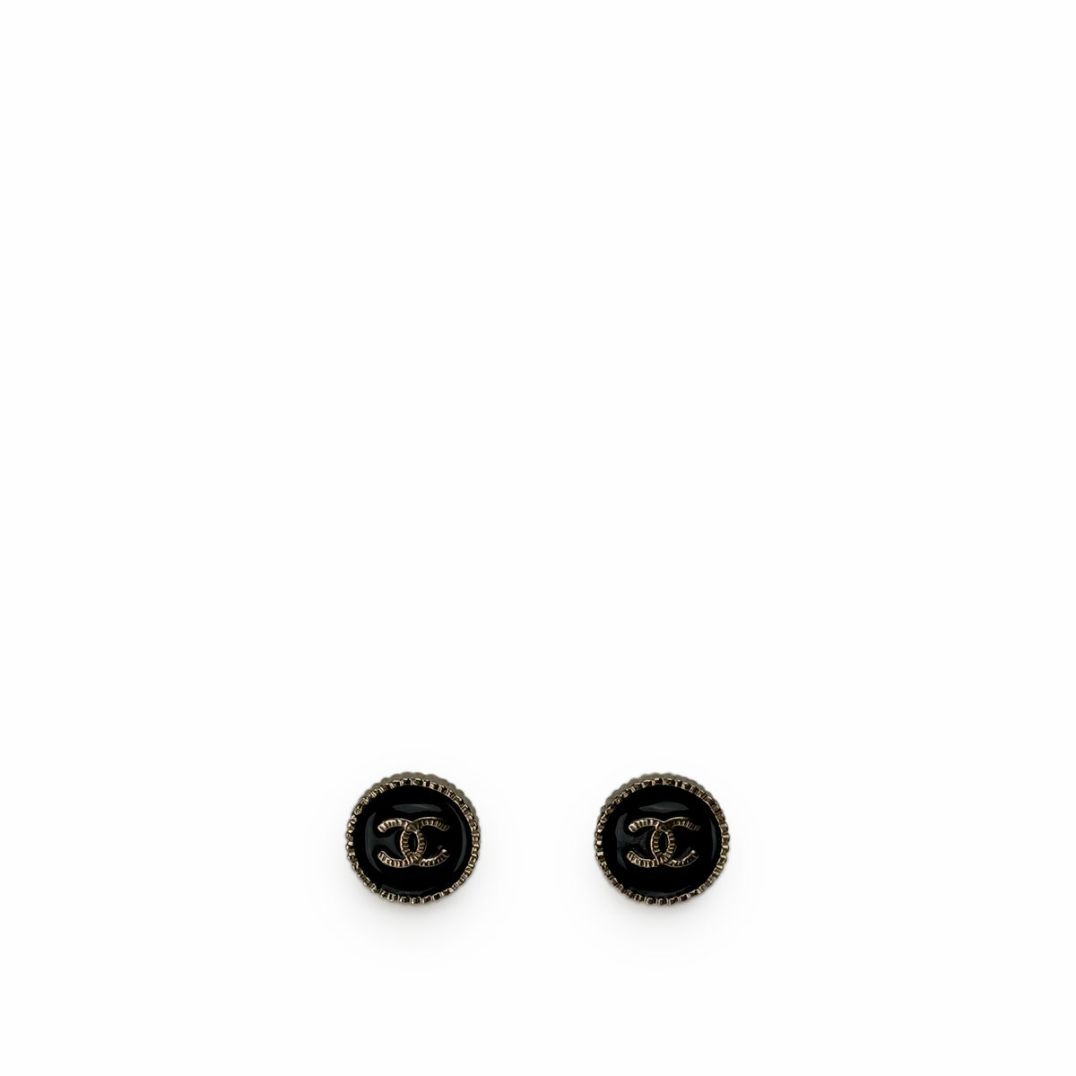 Chanel black enamel stud earrings with gold-tone CC logo, curated Pre-loved Luxury by Myluxe in Helsinki.