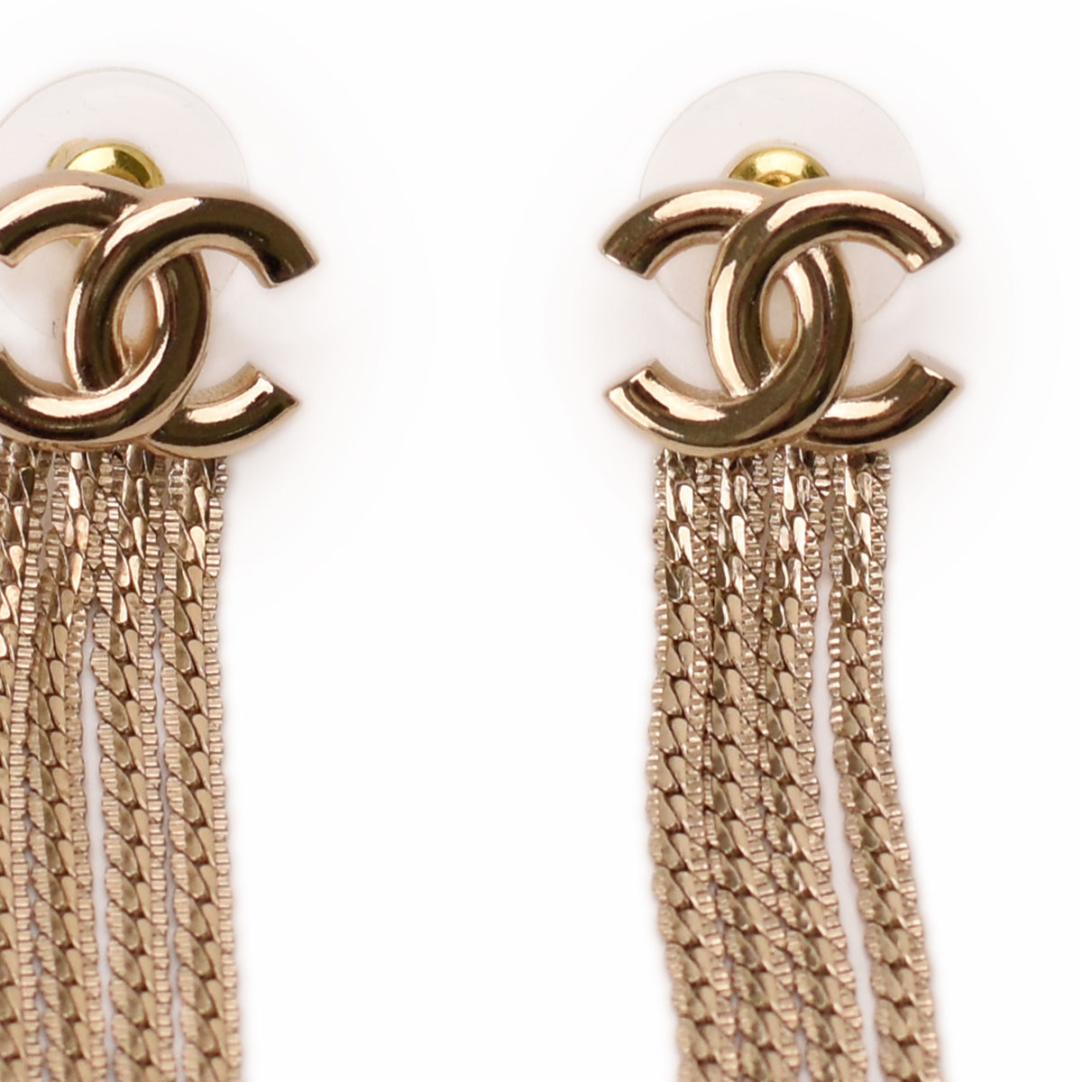 Chanel gold-tone interlocking CC logo tassel earrings with multi-strand chains. curated Pre-loved Luxury by Myluxe in Helsinki.