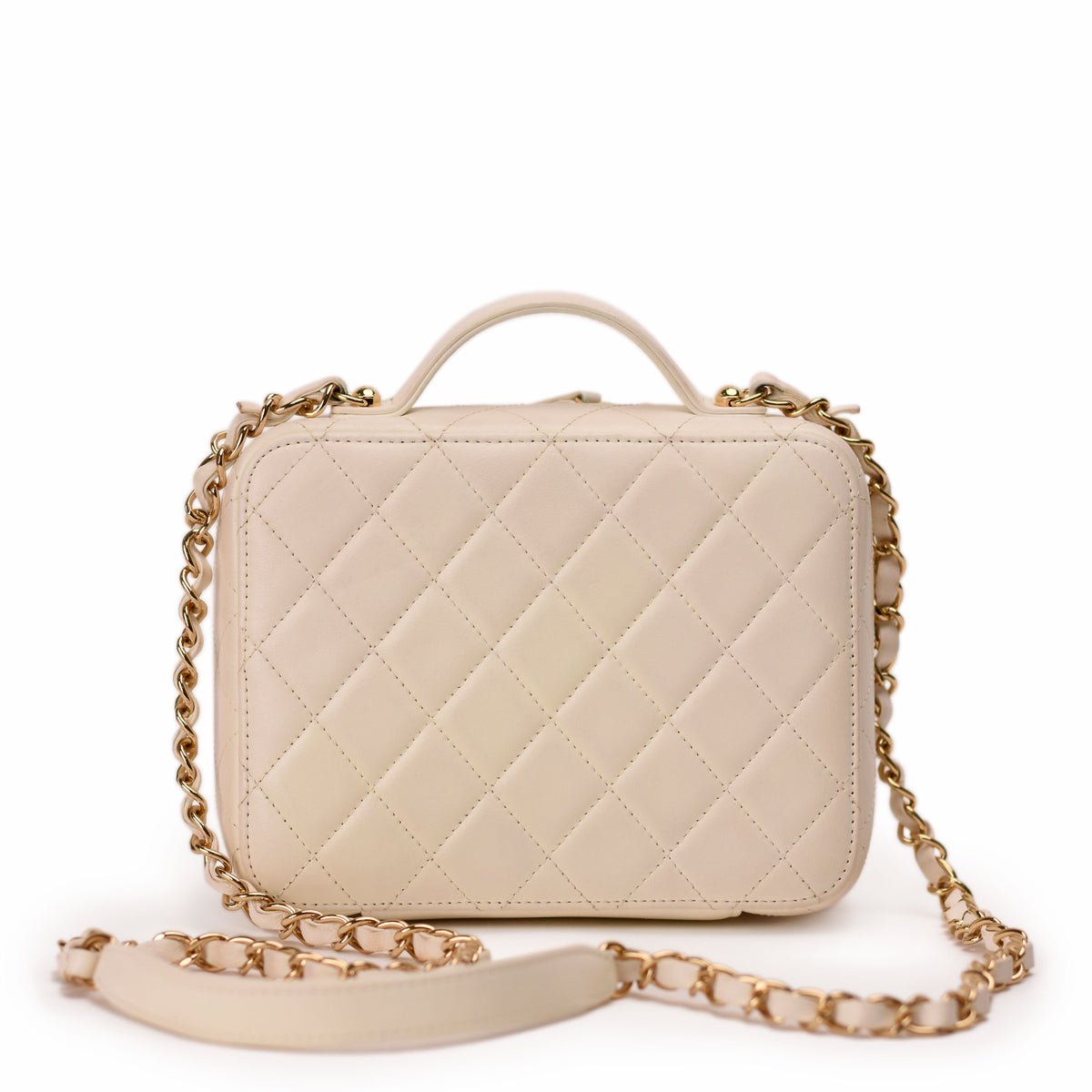 Cream quilted leather Chanel handbag with gold chain strap. curated Pre-loved Luxury by Myluxe in Helsinki.