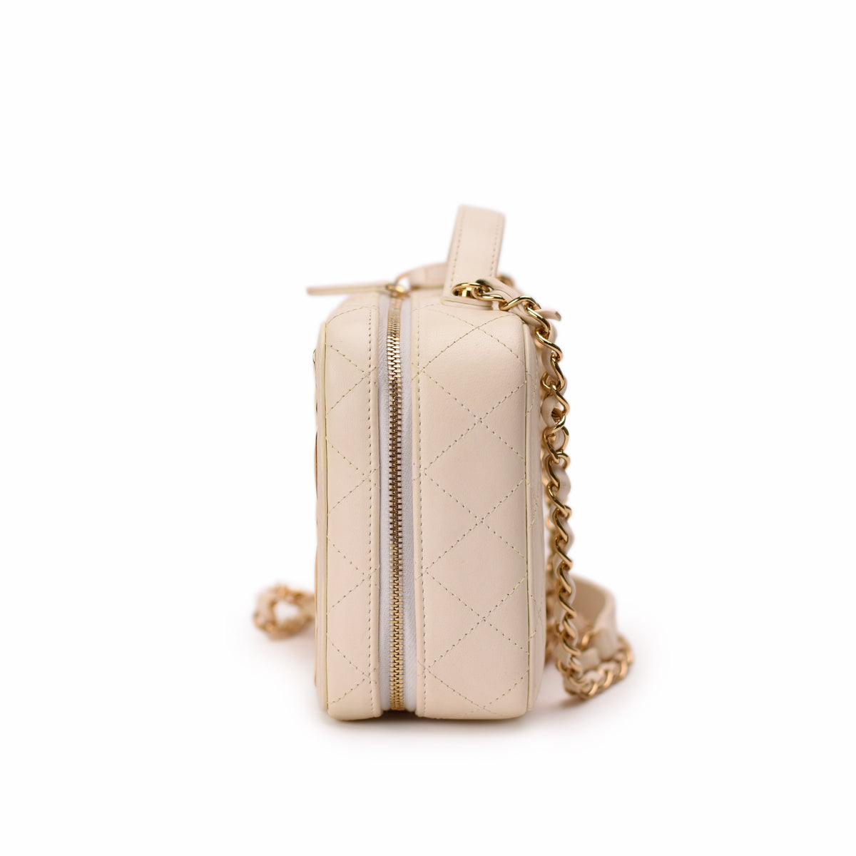 Cream quilted leather crossbody bag with gold chain strap. curated Pre-loved Luxury by Myluxe in Helsinki.