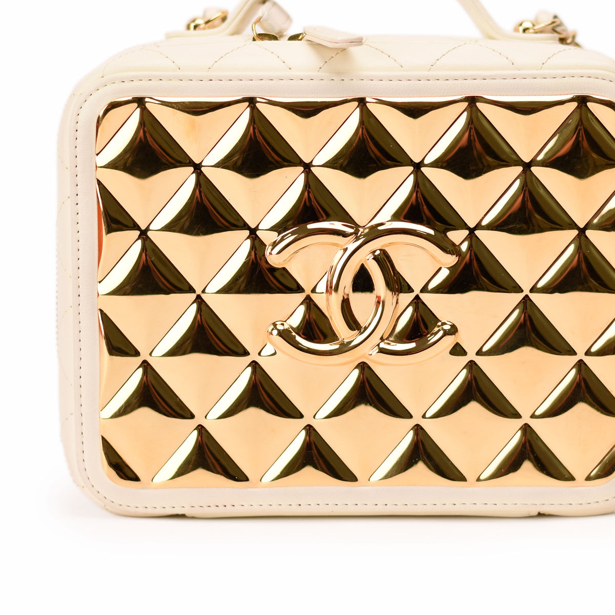Chanel gold metallic pyramid quilted handbag with interlocking CC logo. curated Pre-loved Luxury by Myluxe in Helsinki.