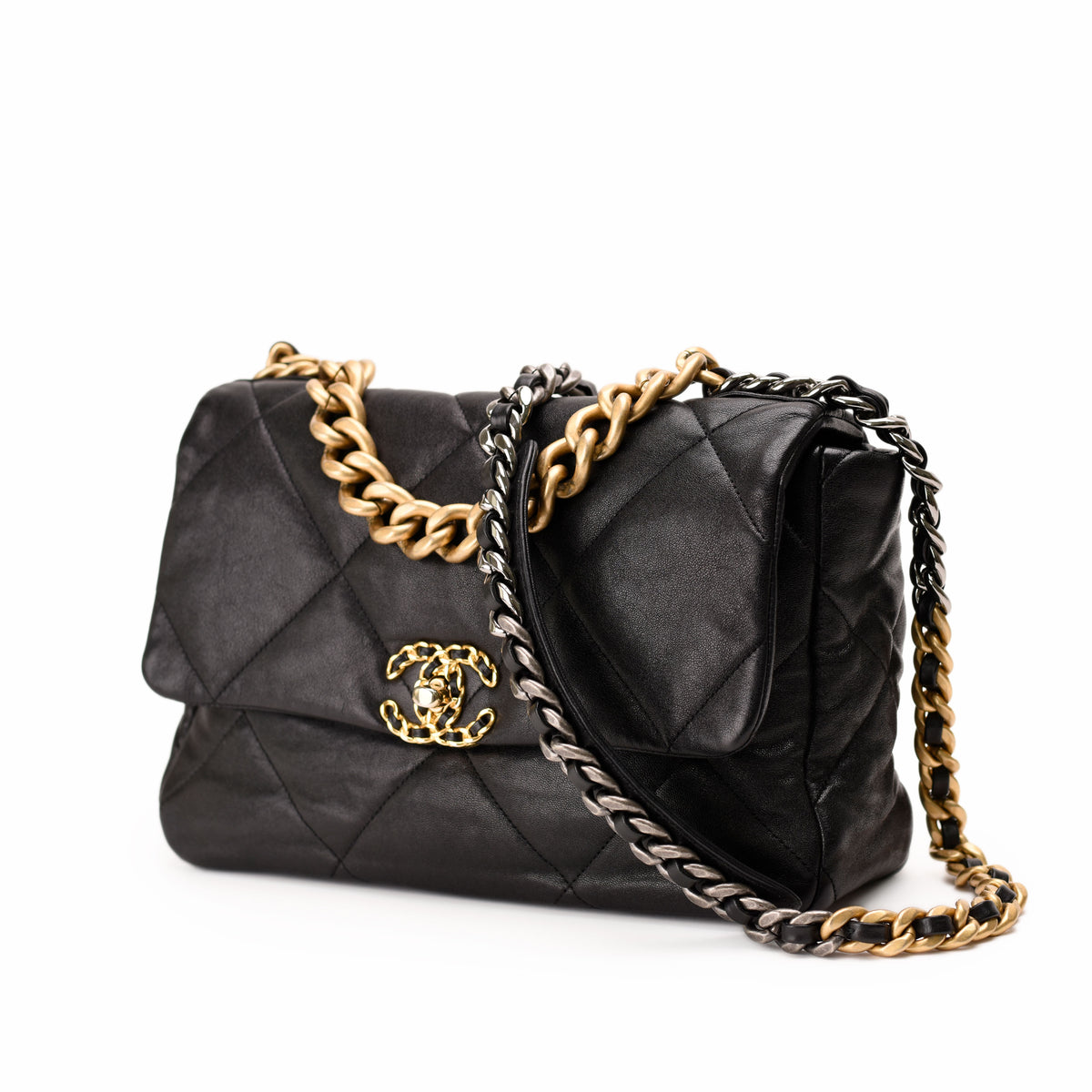 Black quilted lambskin Chanel flap bag with gold and silver chain strap, curated Pre-loved Luxury by Myluxe in Helsinki.