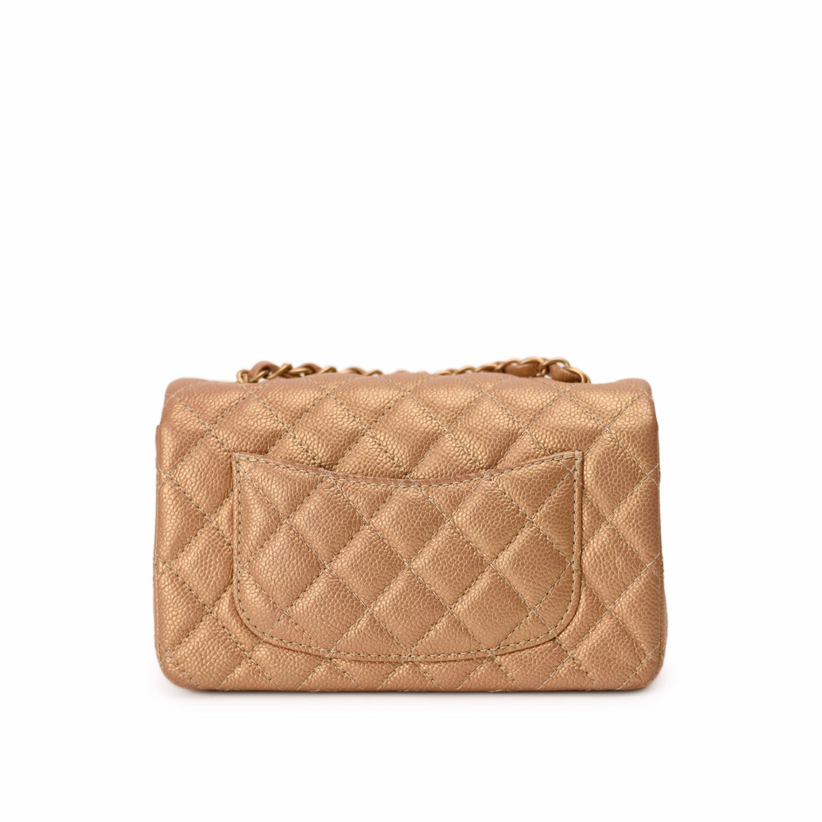 Chanel gold quilted leather crossbody bag with chain strap. curated Pre-loved Luxury by Myluxe in Helsinki.